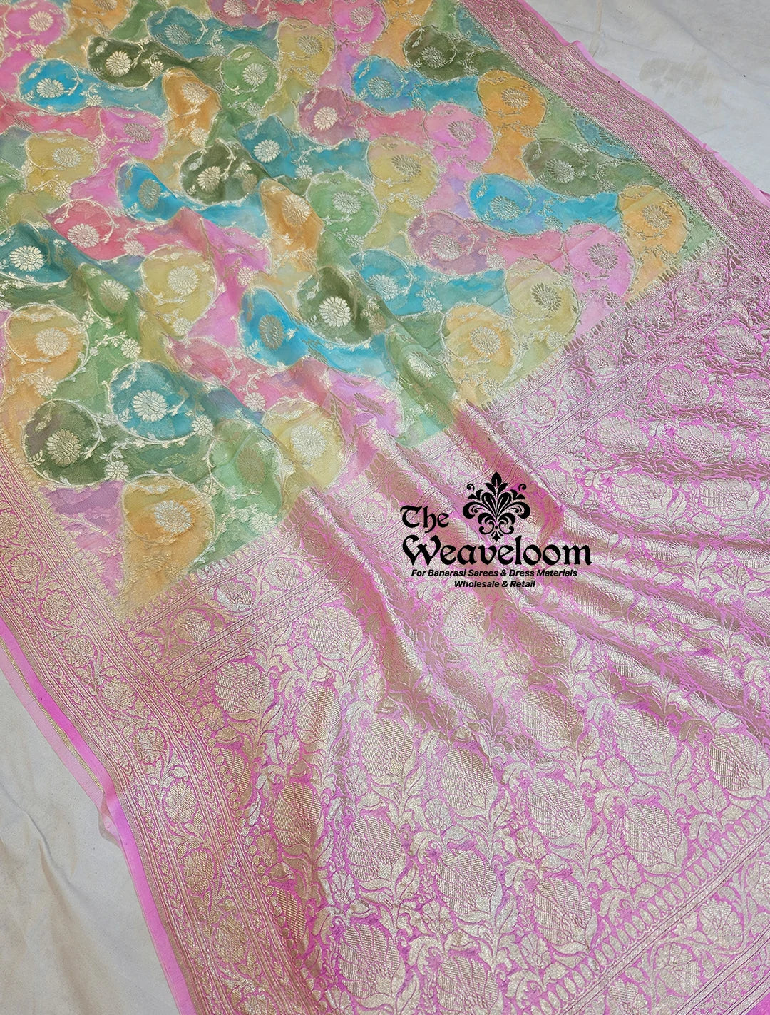 Rangkat Multi-Colour Khaddi Georgette Banarasi Saree with intricate water zari detailing and custom colour options.