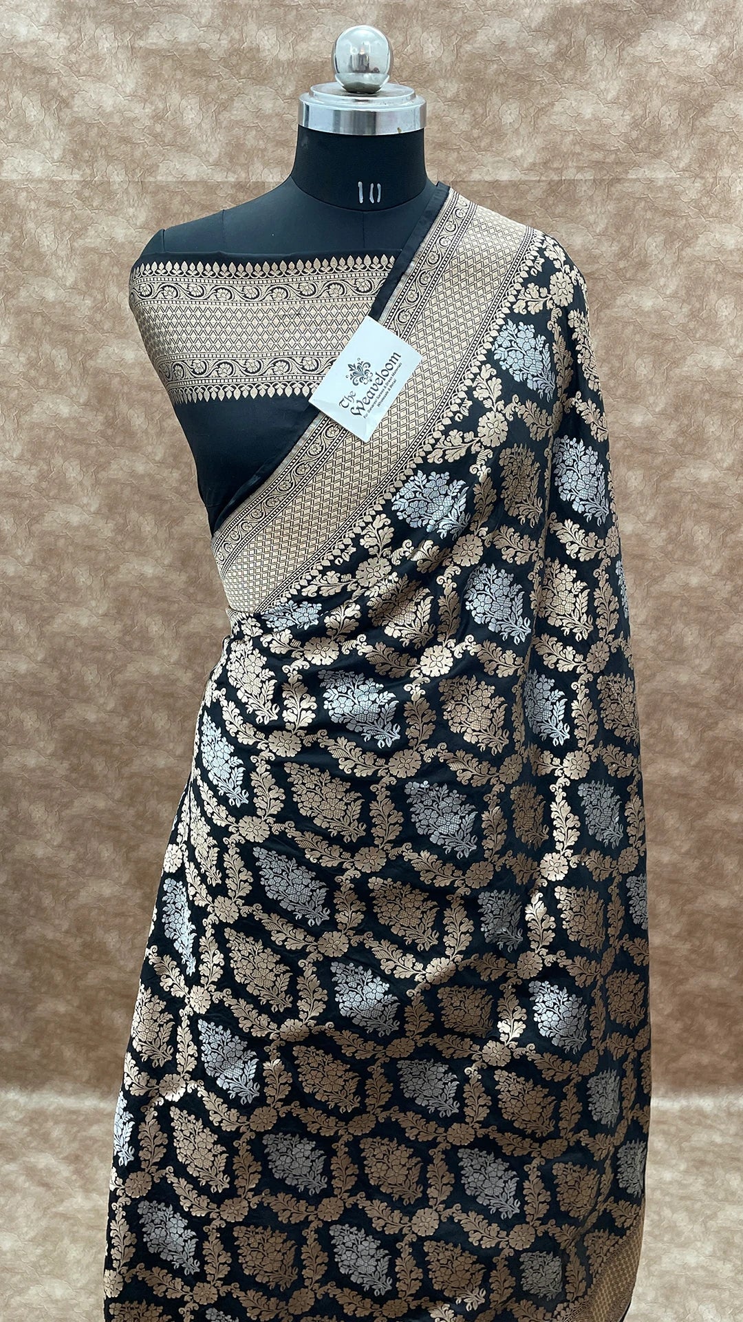 Nita Ambani Inspired Black Katan Silk Banarasi Saree with Gold and Silver Zari Floral Motifs by The Weaveloom