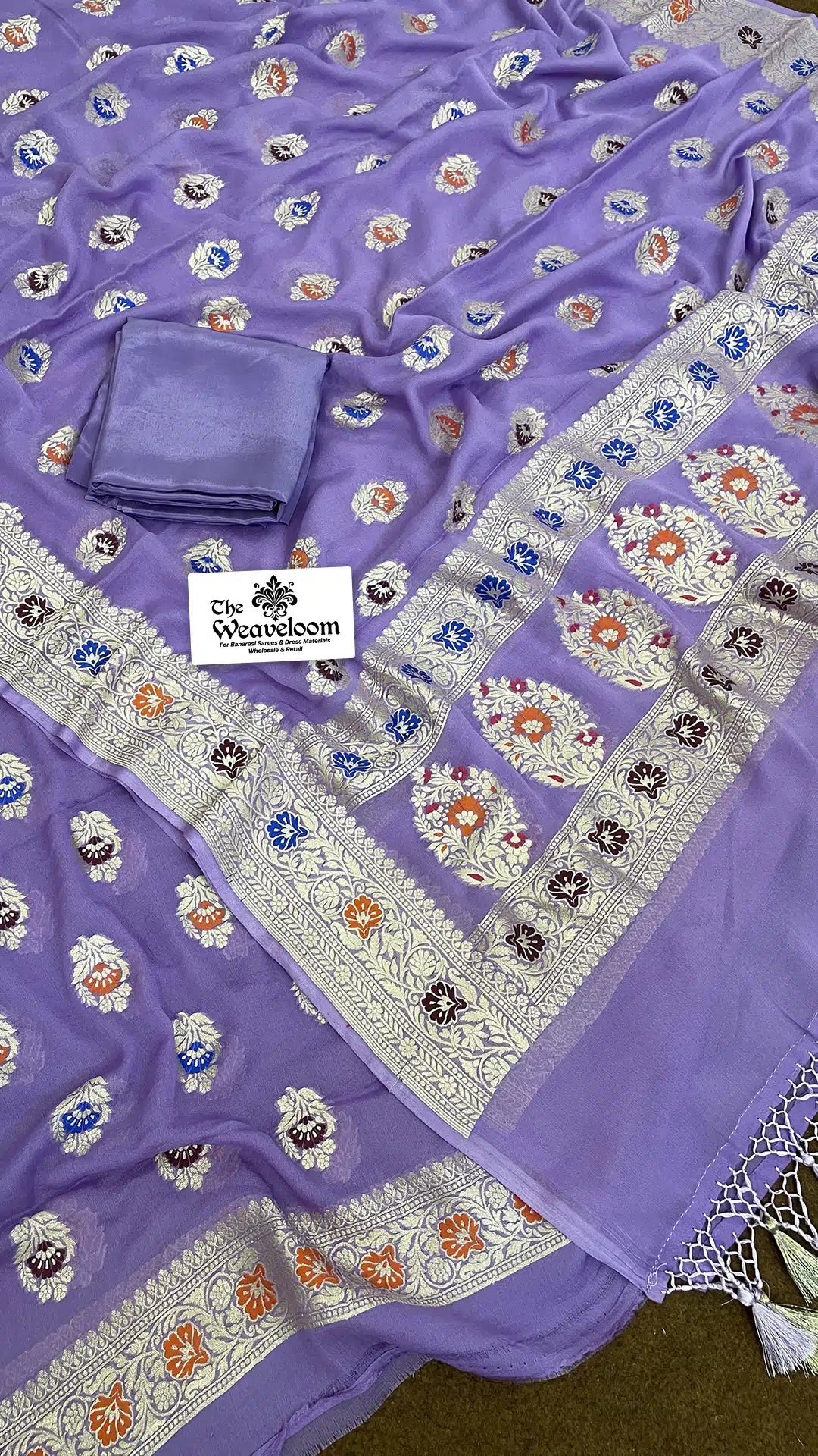 The Weaveloom lavender georgette banarasi dress material with multicolor meenakari motifs and dupatta