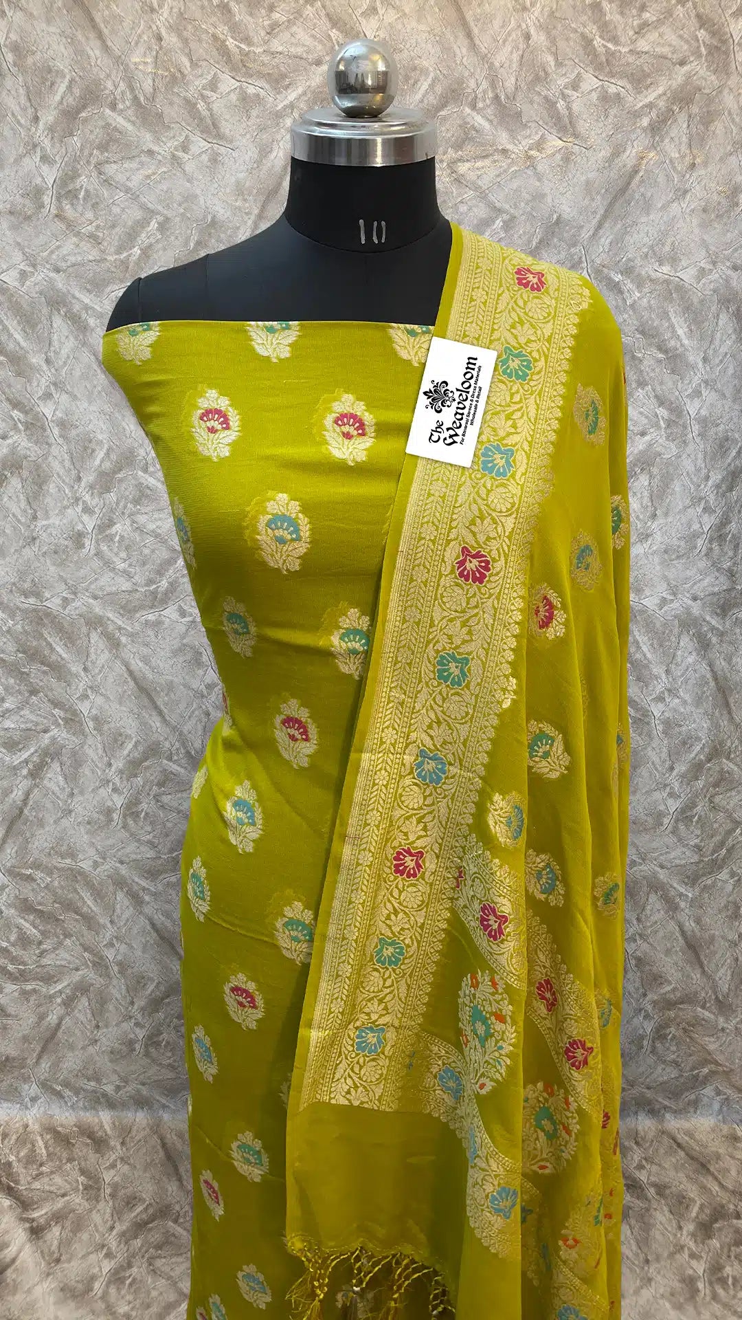 The Weaveloom mehendi green georgette Banarasi dress material with full Meenakari embroidery and unstitched dupatta set