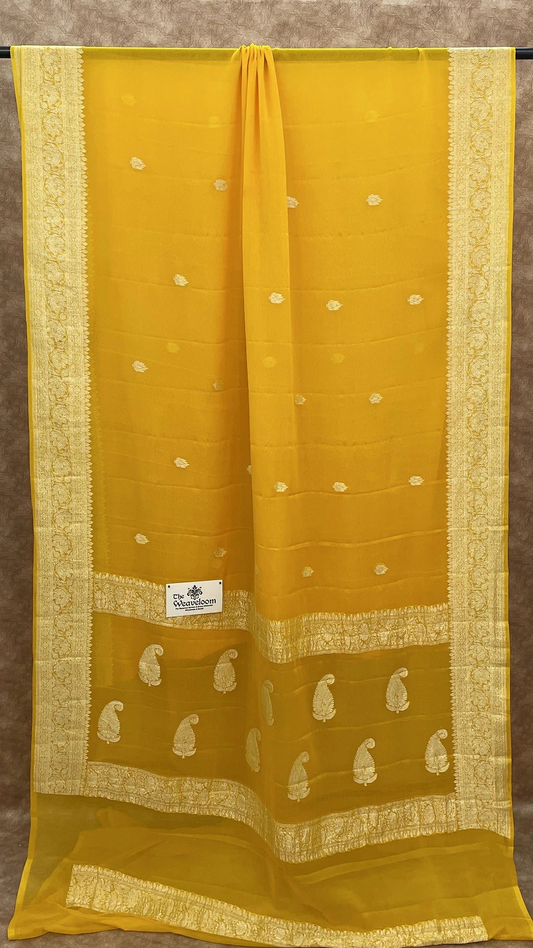 Mustard yellow pure khaddi georgette kadwa handloom Banarasi saree with silver zari from The Weaveloom
