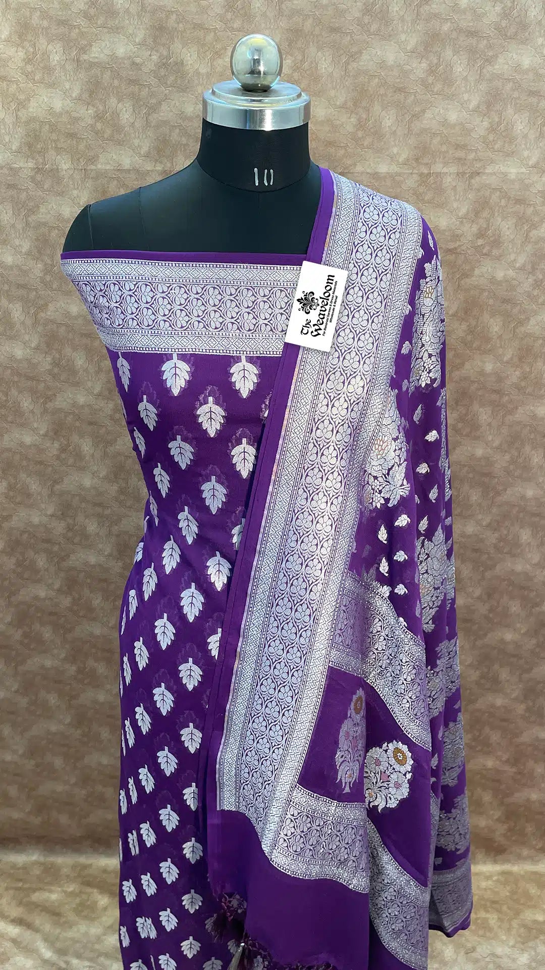 The Weaveloom purple georgette Banarasi dress material with silver zari and Meenakari dupatta – unstitched salwar suit set