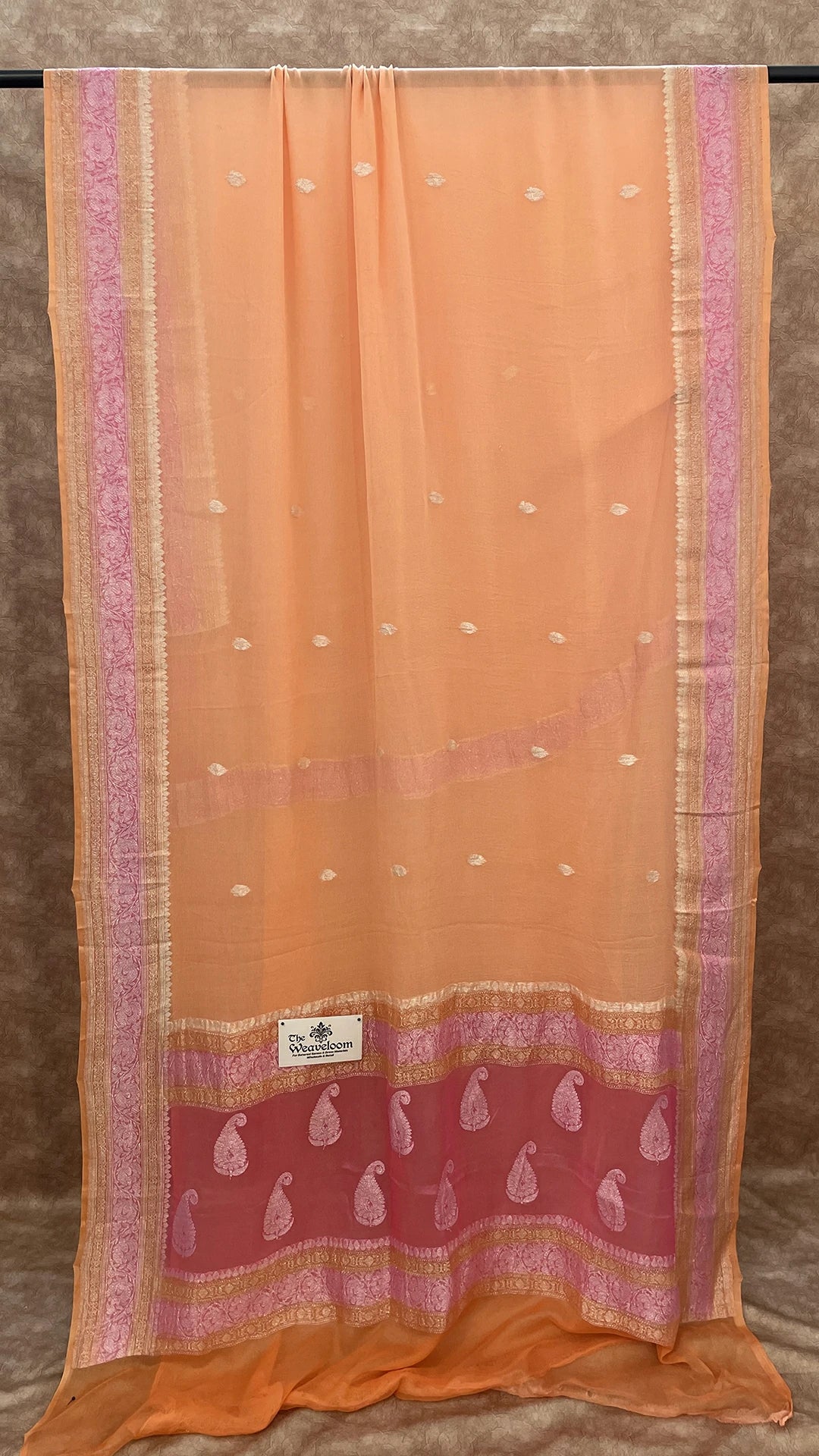 The Weaveloom Peach Khaddi Georgette Handloom Kadwa Banarasi Saree with Silver Zari
