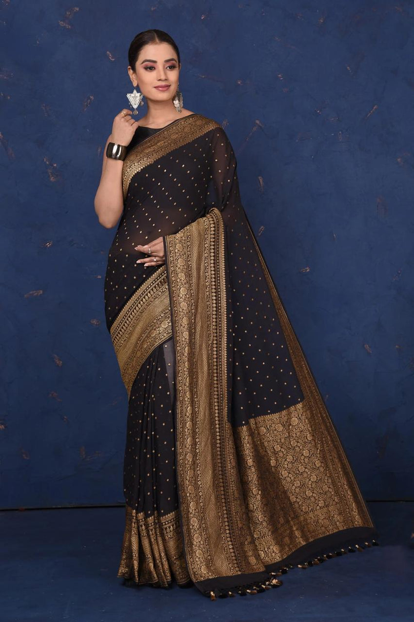 Black Khaddi Georgette Pure Banarasi Saree with antique zari work, showcasing luxurious fabric, elegant draping, and exquisite craftsmanship.