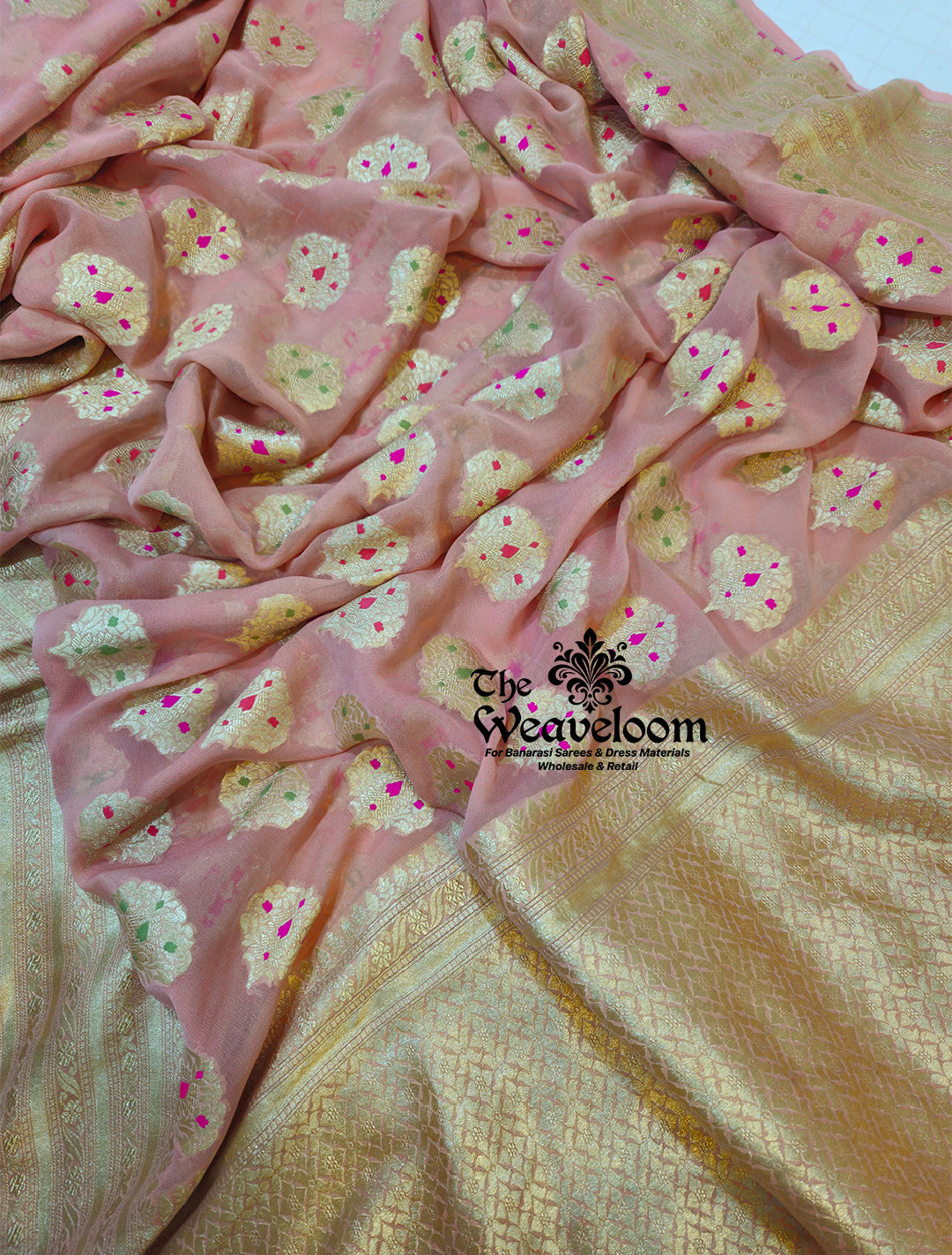 Peach Khaddi Georgette Water Zari Pure Banarasi Saree with Meenakari design, handcrafted with intricate detailing, lightweight fabric, and 100% customizable color options, perfect for weddings and festive occasions.