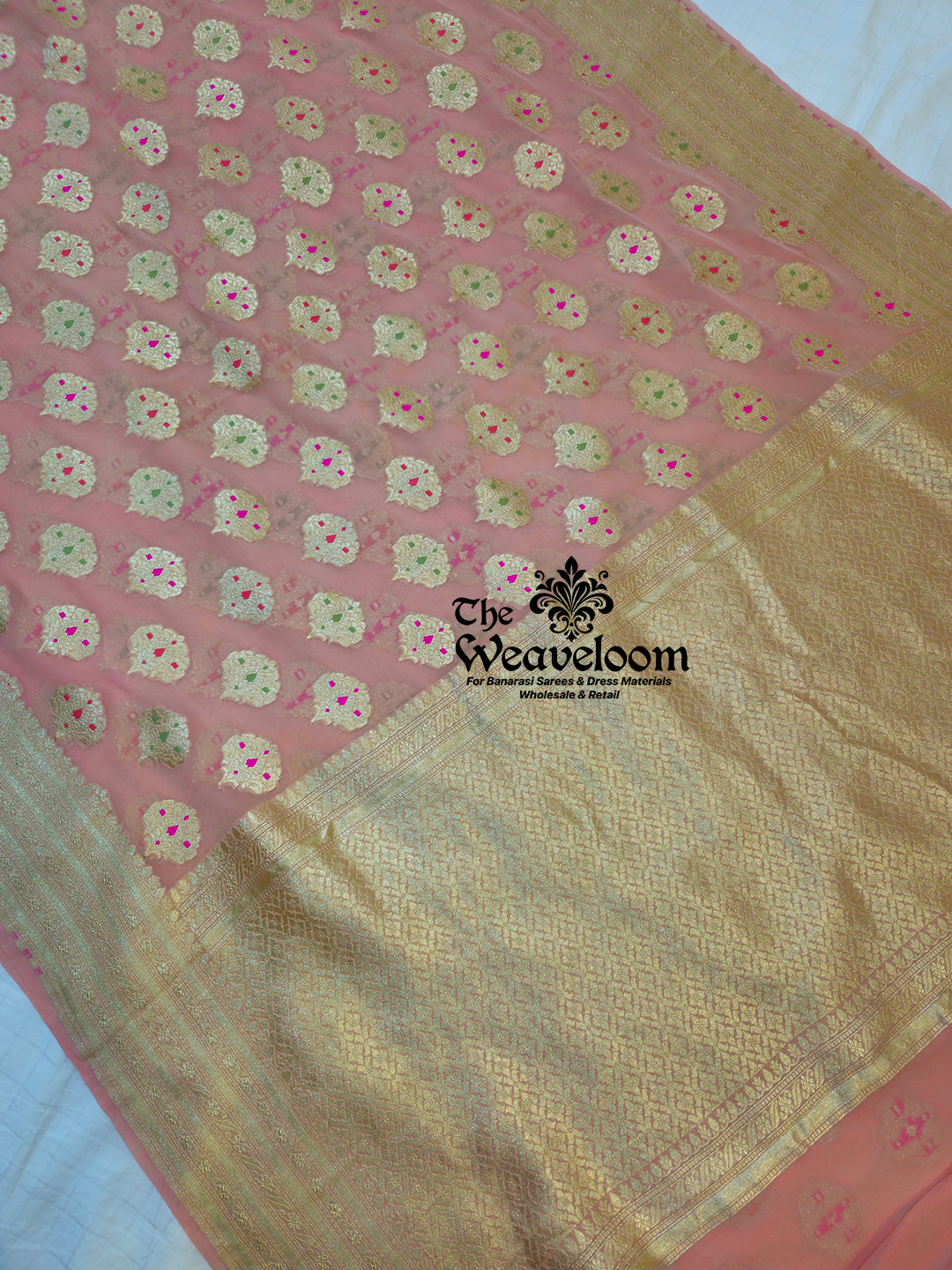 Peach Khaddi Georgette Water Zari Pure Banarasi Saree with Meenakari design, handcrafted with intricate detailing, lightweight fabric, and 100% customizable color options, perfect for weddings and festive occasions.