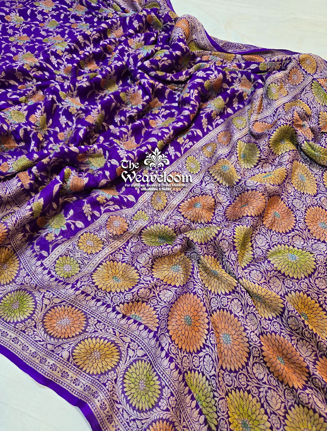 Violet Pure Khaddi Chiffon Banarasi Saree with floral jaal work from The Weaveloom. Elegant, lightweight & perfect for festive occasions.