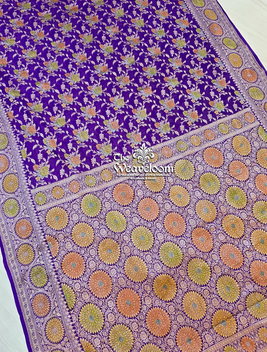 Violet Pure Khaddi Chiffon Banarasi Saree with floral jaal work from The Weaveloom. Elegant, lightweight & perfect for festive occasions.