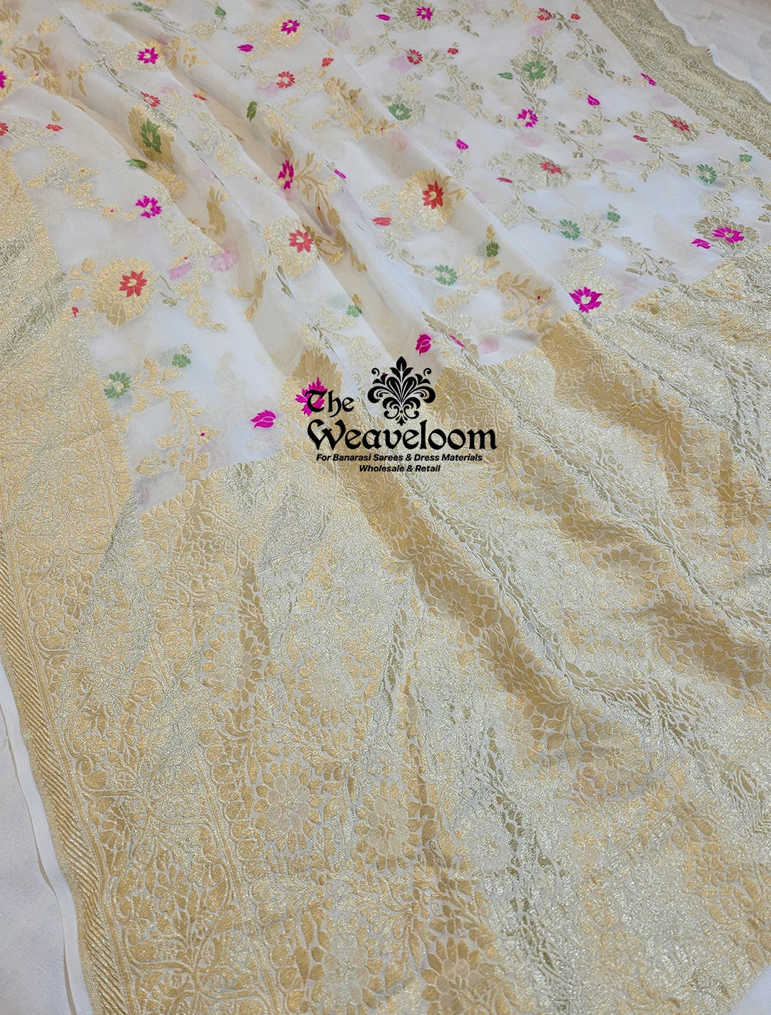 White Khaddi Georgette Water Zari Pure Banarasi Saree with Meenakari, showcasing delicate Meenakari work and luxurious lightweight fabric.
