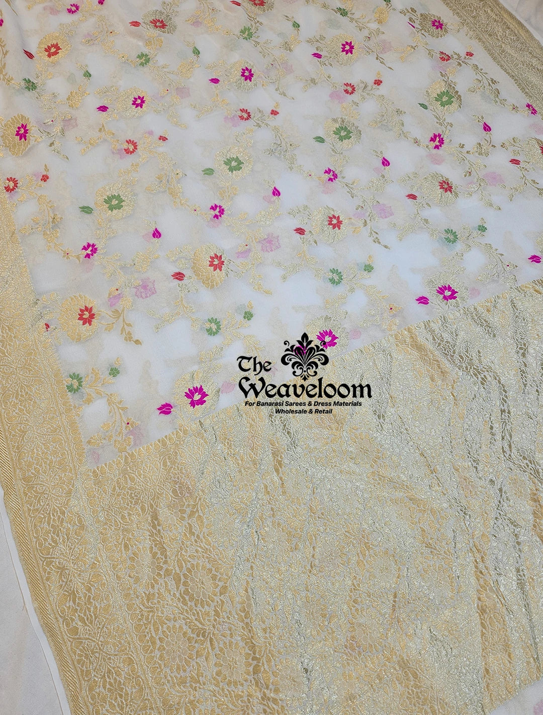 White Khaddi Georgette Water Zari Pure Banarasi Saree with Meenakari, showcasing delicate Meenakari work and luxurious lightweight fabric.