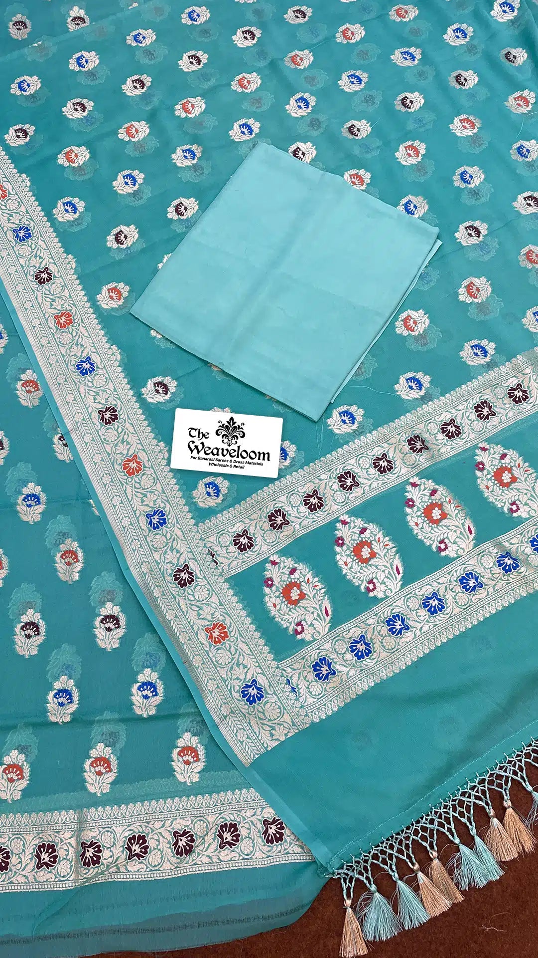 The Weaveloom aqua georgette meenakari dress material with zari dupatta – unstitched salwar suit set