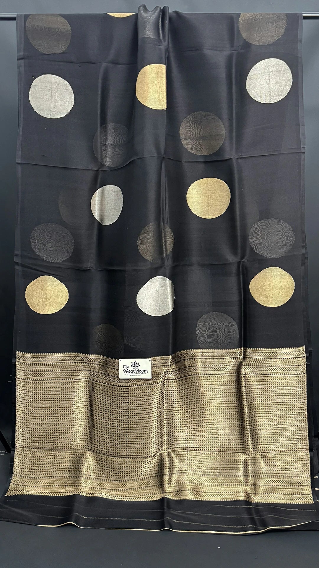 The Weaveloom black kora silk banarasi saree with sona rupa zari polka dot pattern handloom