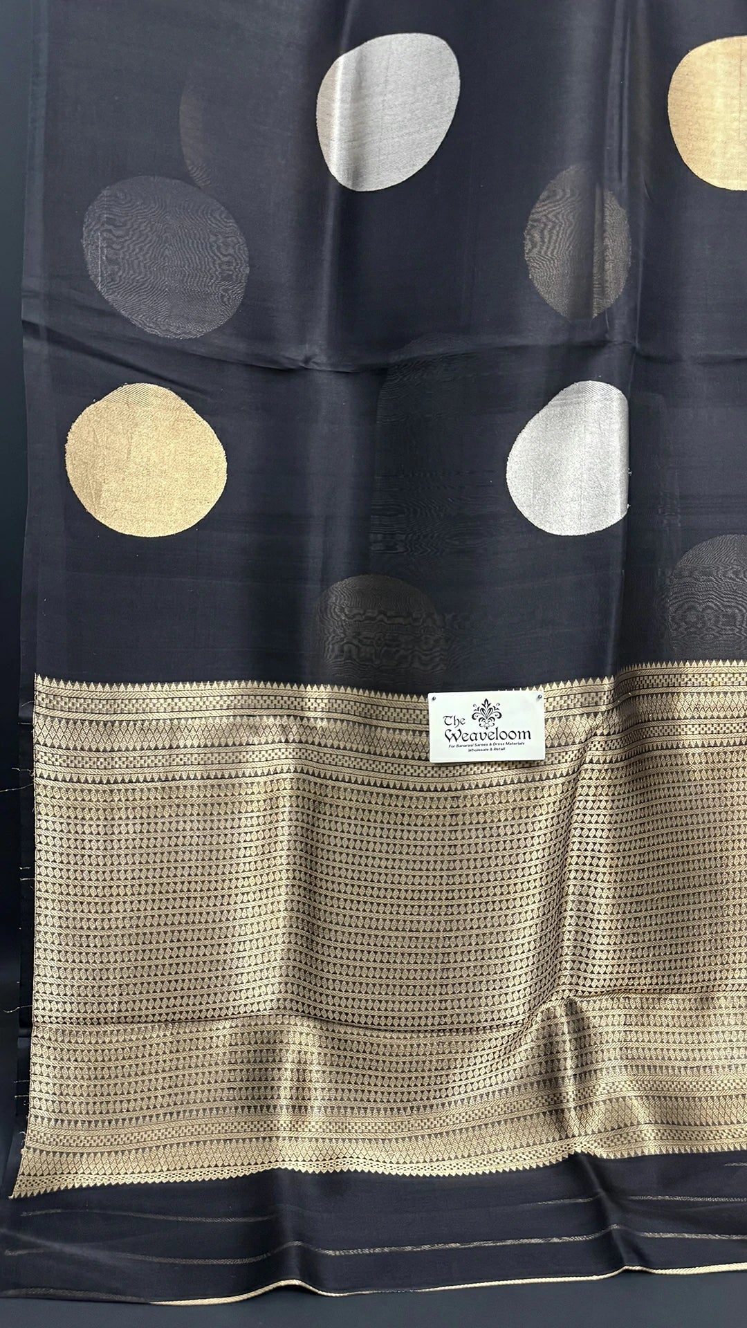 The Weaveloom black kora silk banarasi saree with sona rupa zari polka dot pattern handloom