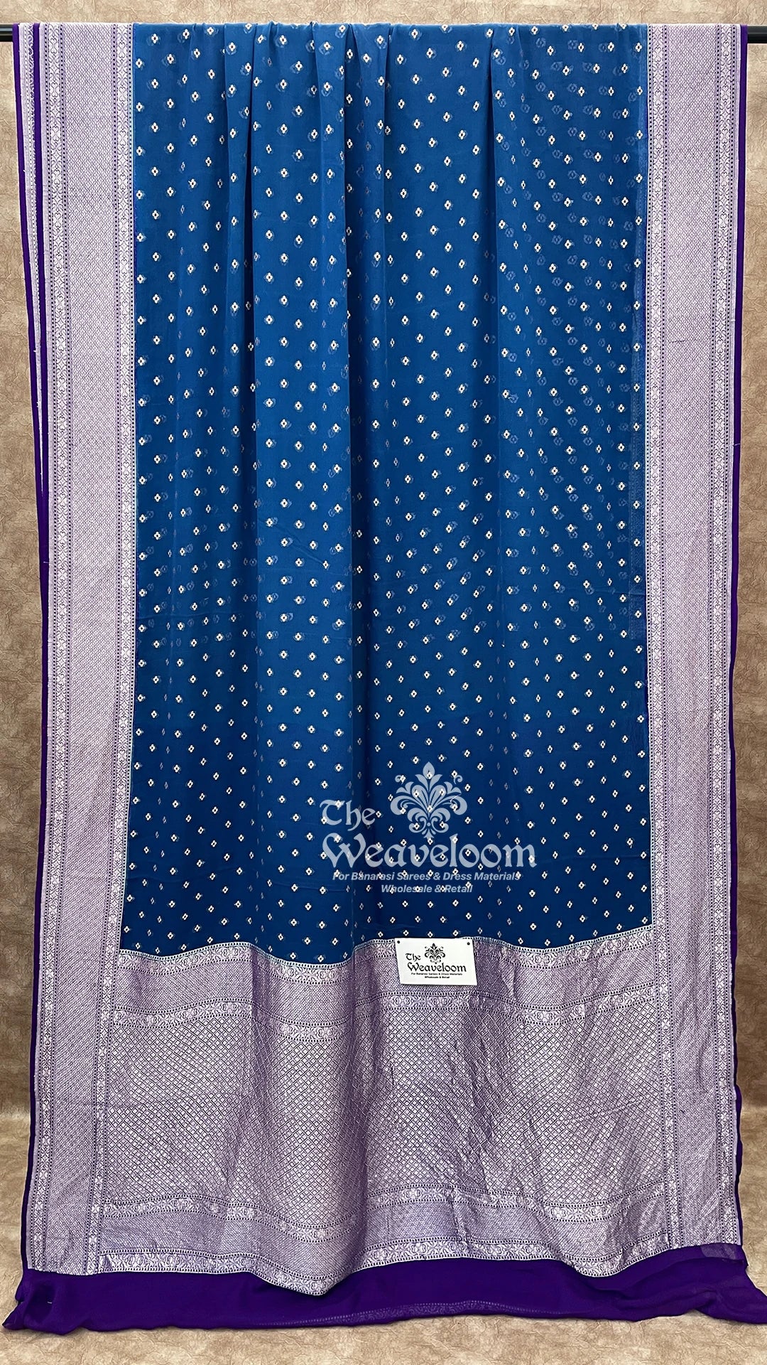 Blue contrast silver zari floral buti Khaddi Georgette pure Banarasi saree by The Weaveloom
