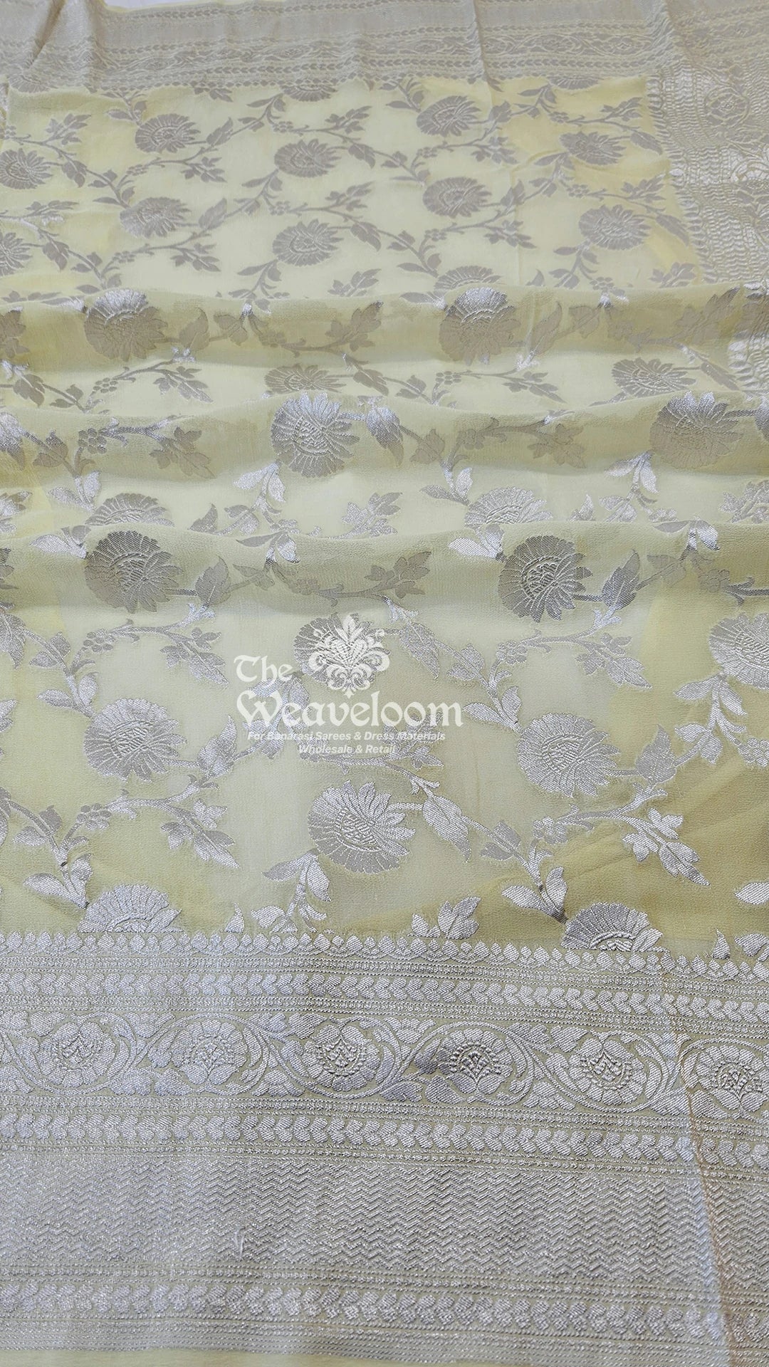 Cream floral jaal silver zari Khaddi Georgette pure Banarasi saree by The Weaveloom