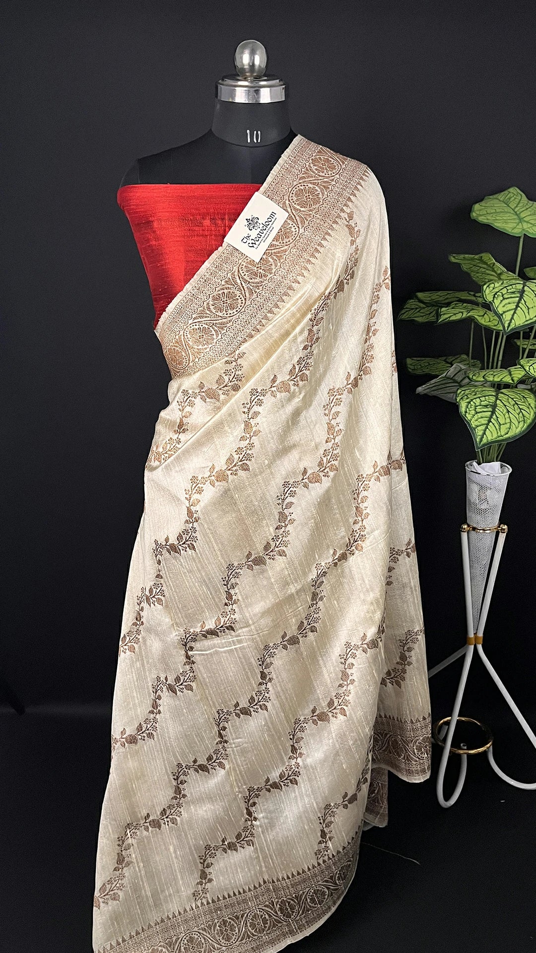 Cream Pure Raw Silk Banarasi Saree with Antique Zari Floral Motifs and Ornate Border by The Weaveloom