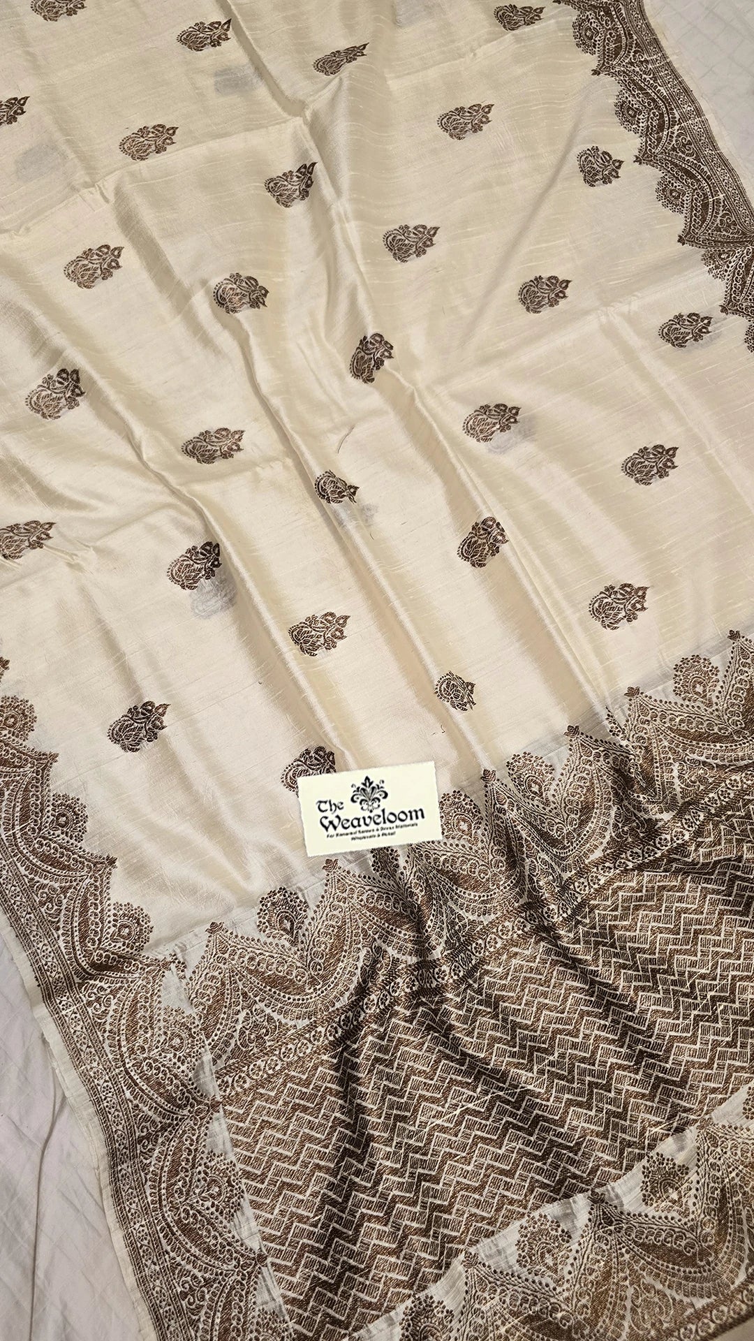 Cream raw silk pure handloom Banarasi saree with antique zari border and buti pattern by The Weaveloom