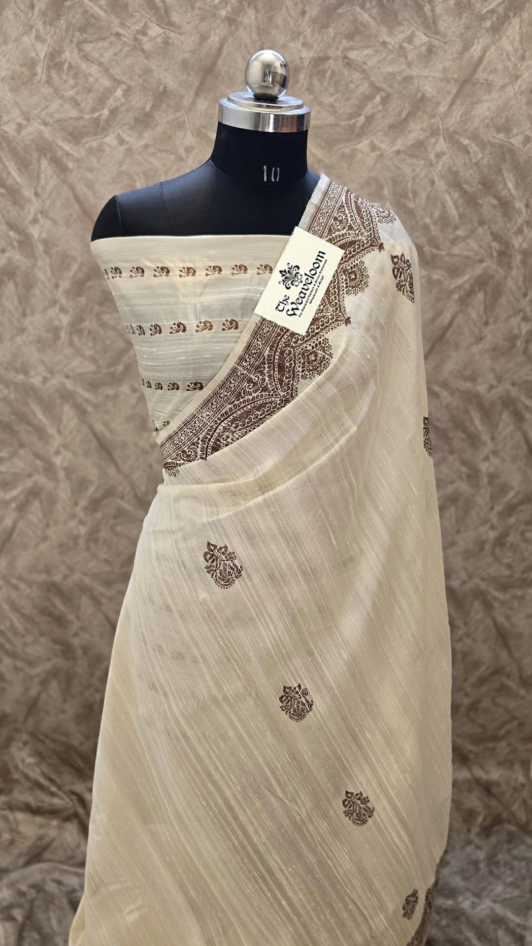 Cream raw silk pure handloom Banarasi saree with antique zari border and buti pattern by The Weaveloom