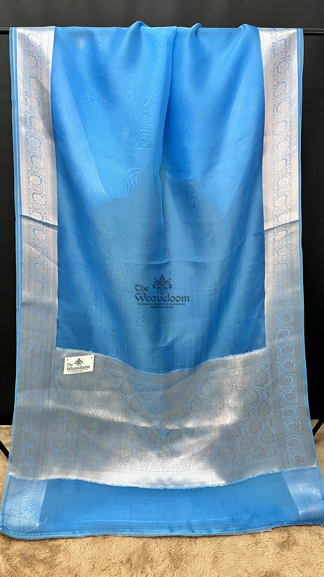 Firozi blue pure kora silk Banarasi saree with floral border by The Weaveloom