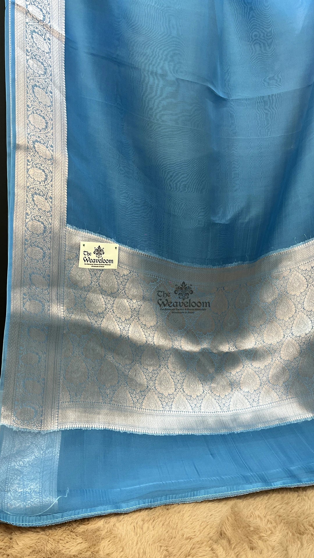 Firozi blue pure kora silk Banarasi saree with floral border by The Weaveloom