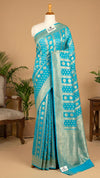 Firozi Khaddi Georgette Banarasi Saree with Silver Water Zari Striped Booti Pallu by The Weaveloom