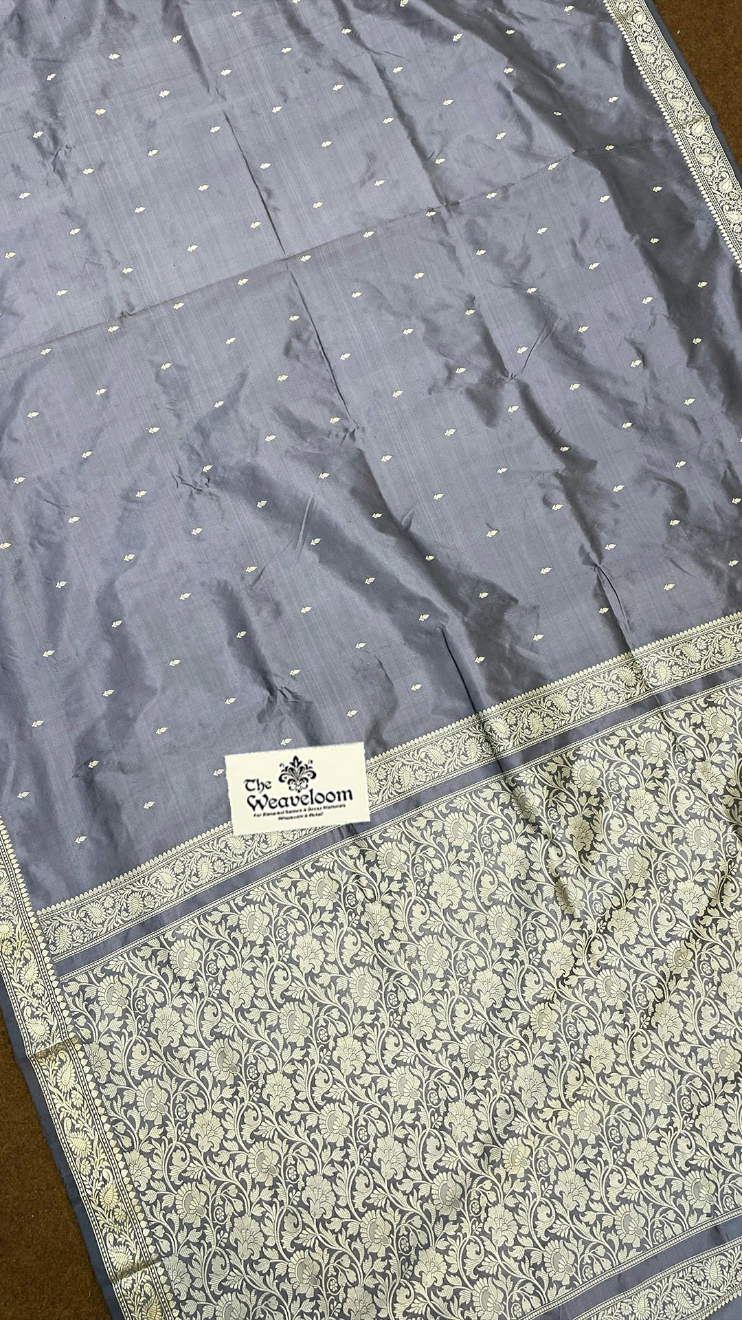 Glossy Grey Pure Katan Silk Handloom Banarasi Saree with Zari Buta and Floral Pallu by The Weaveloom