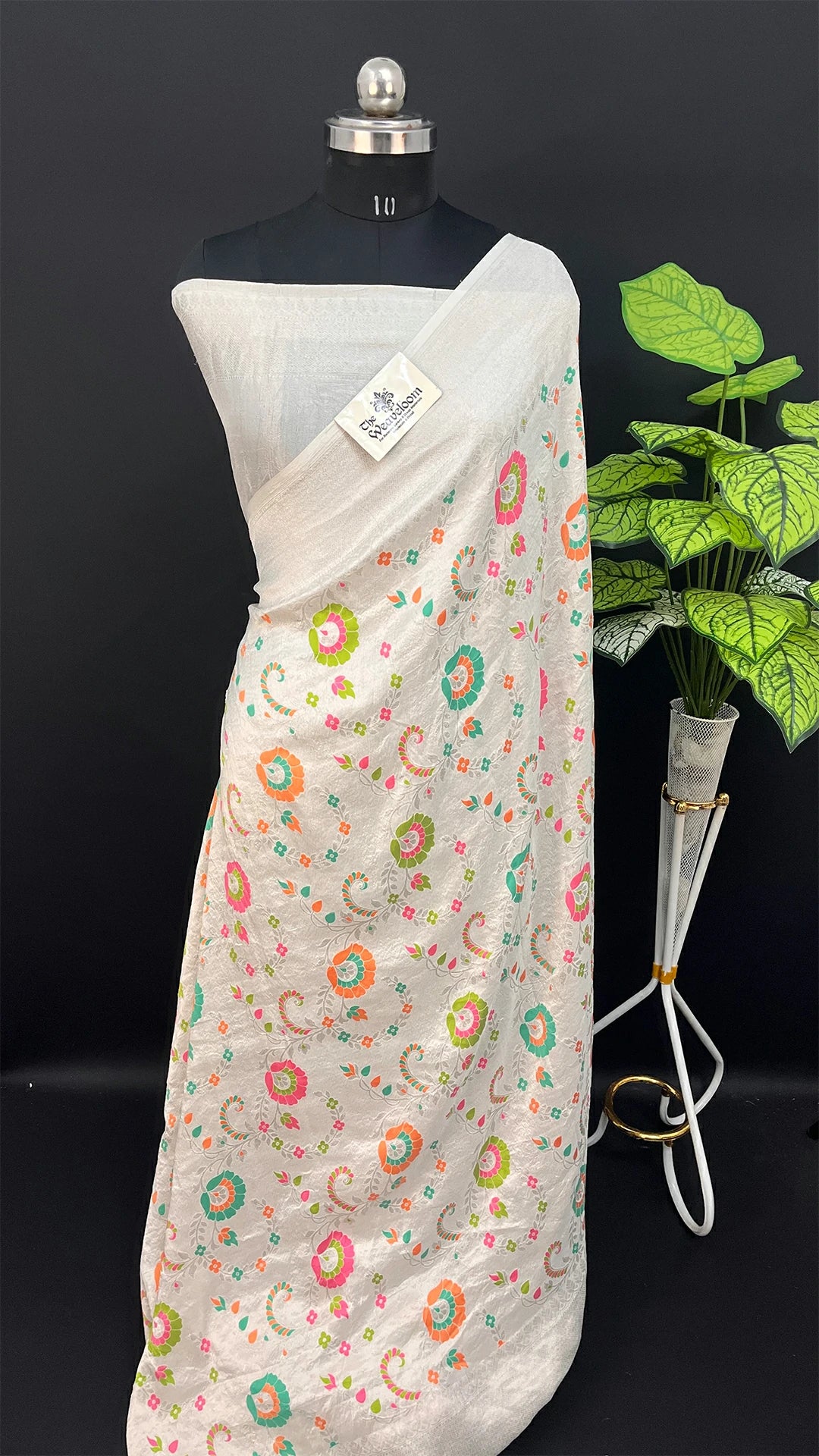 Ivory Pure Tussar Georgette Meenakari Banarasi Saree with Pastel Floral Motifs by The Weaveloom