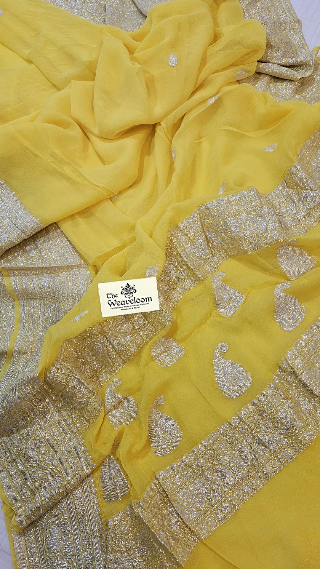 Lemon Khaddi Georgette Pure Banarasi Saree with Silver Zari Paisley Border by The Weaveloom