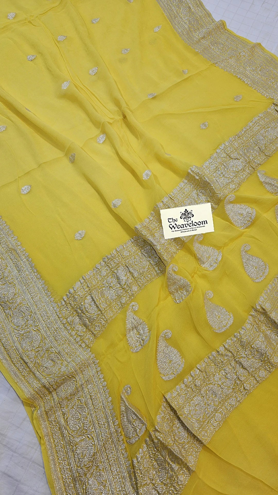 Lemon Khaddi Georgette Pure Banarasi Saree with Silver Zari Paisley Border by The Weaveloom