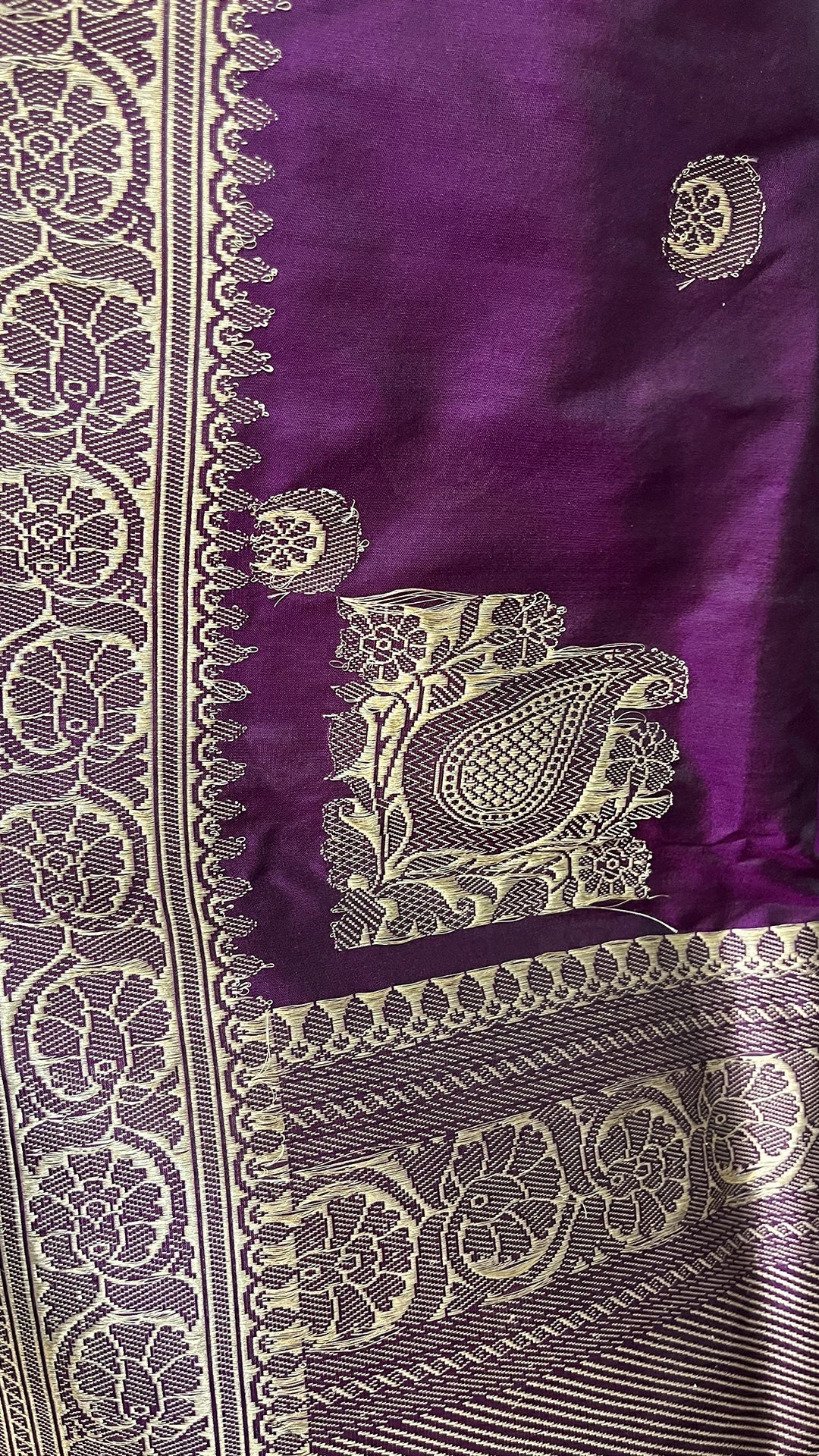 Shop magenta pure Katan silk handloom Banarasi saree with Chand Tara motifs and elegant zari border. A luxurious choice for weddings.