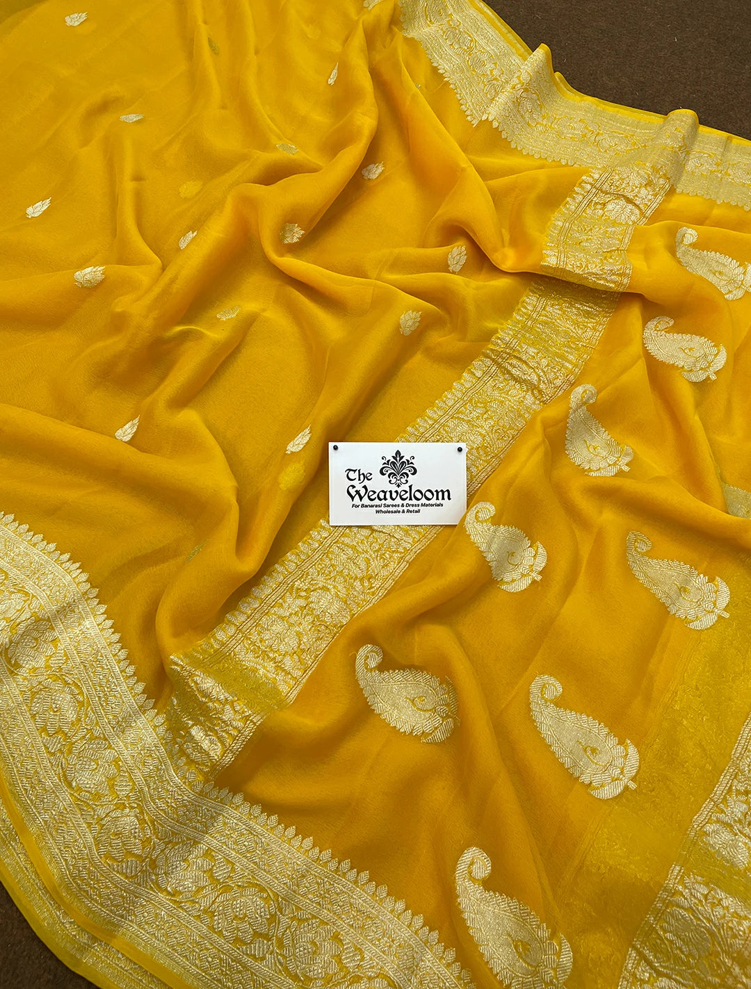 Mustard yellow pure khaddi georgette kadwa handloom Banarasi saree with silver zari from The Weaveloom