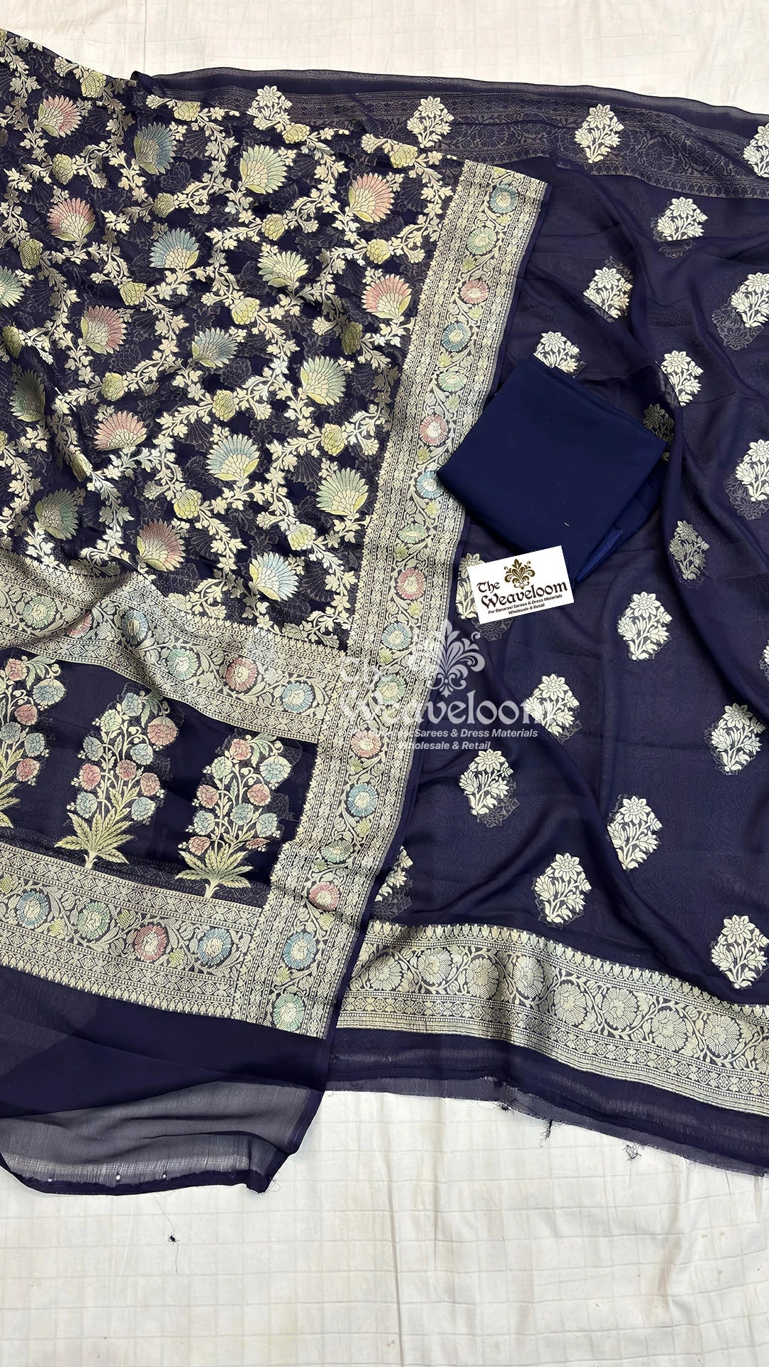The Weaveloom navy blue floral buta Khaddi Georgette pure Banarasi dress material with handbrush work