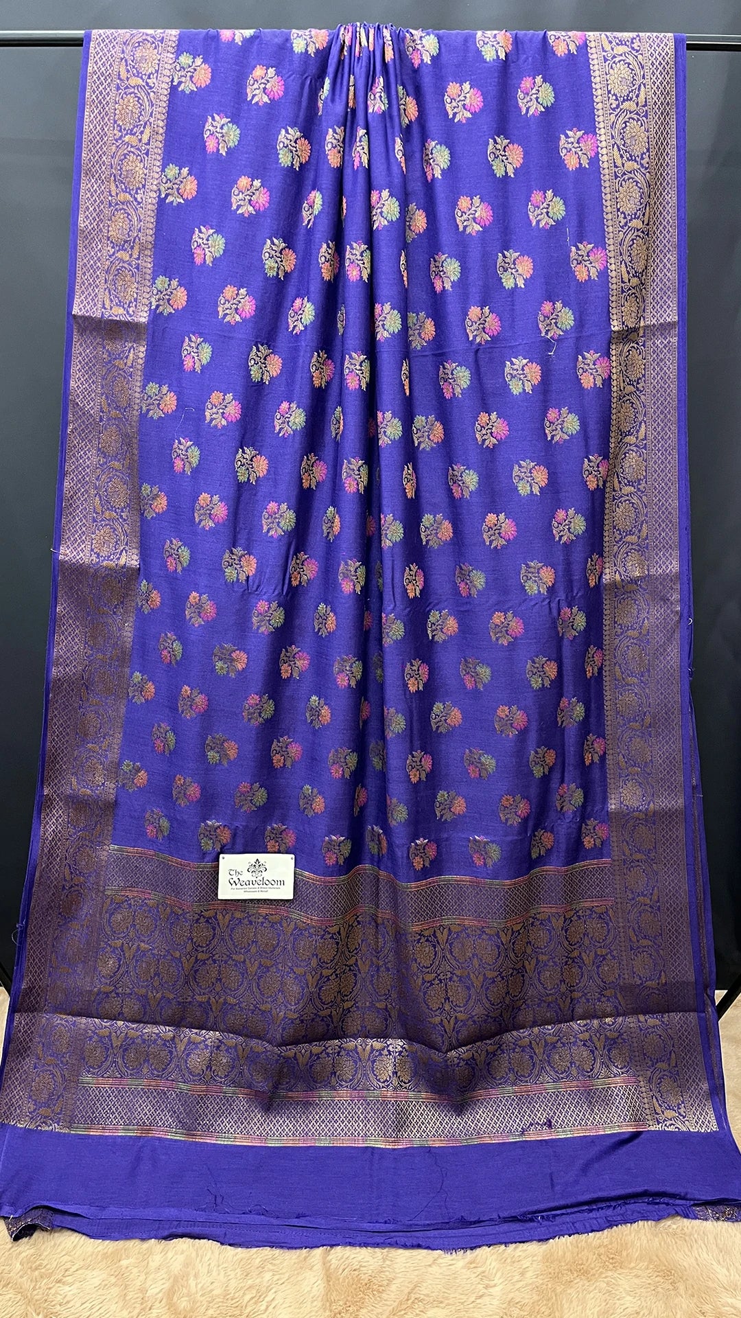 The Weaveloom Navy Blue Munga Silk Pure Banarasi Saree with Floral Meenakari Antique Zari Border and Rich Pallu
