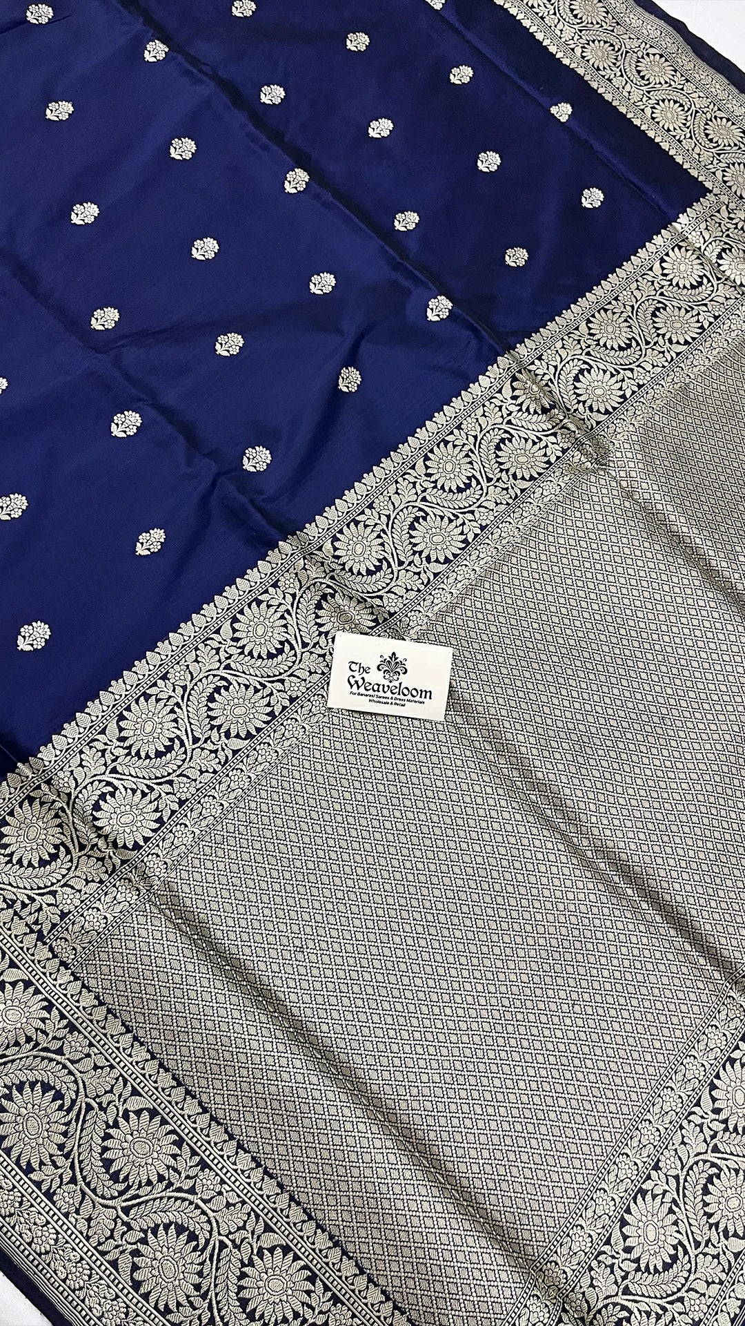 Navy Blue Pure Katan Silk Handloom Banarasi Saree with Silver Zari Buta and Floral Border by The Weaveloom