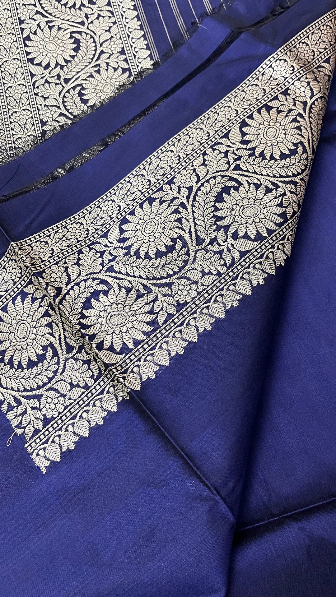 Navy Blue Pure Katan Silk Handloom Banarasi Saree with Silver Zari Buta and Floral Border by The Weaveloom