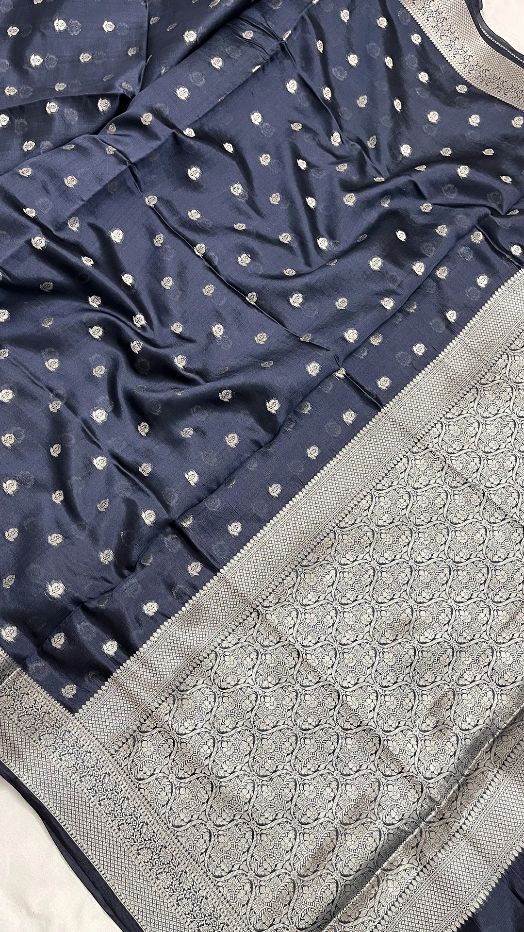 Navy blue pure Dupion silk Banarasi saree with silver buti & brocade pallu by The Weaveloom