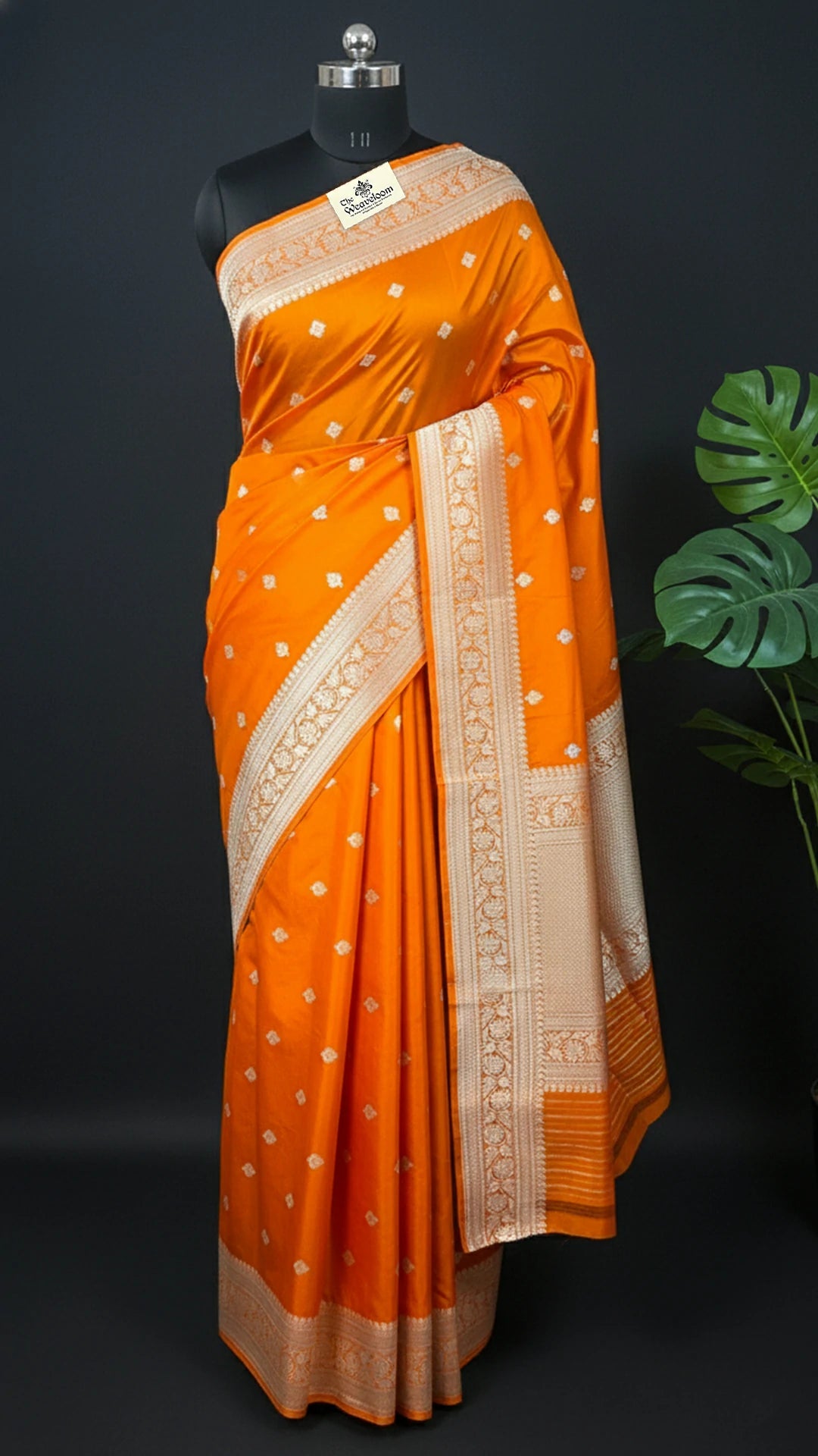 Orange Pure Katan Silk Handloom Banarasi Saree with Silver Zari Floral Border by The Weaveloom