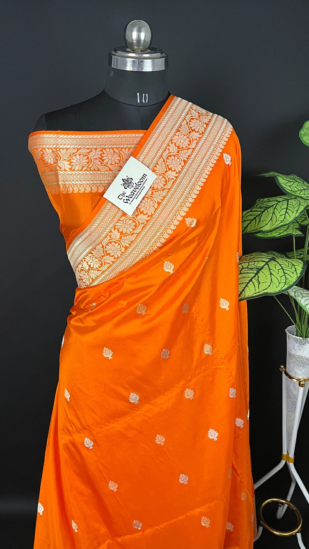 Orange Pure Katan Silk Handloom Banarasi Saree with Silver Zari Floral Border by The Weaveloom