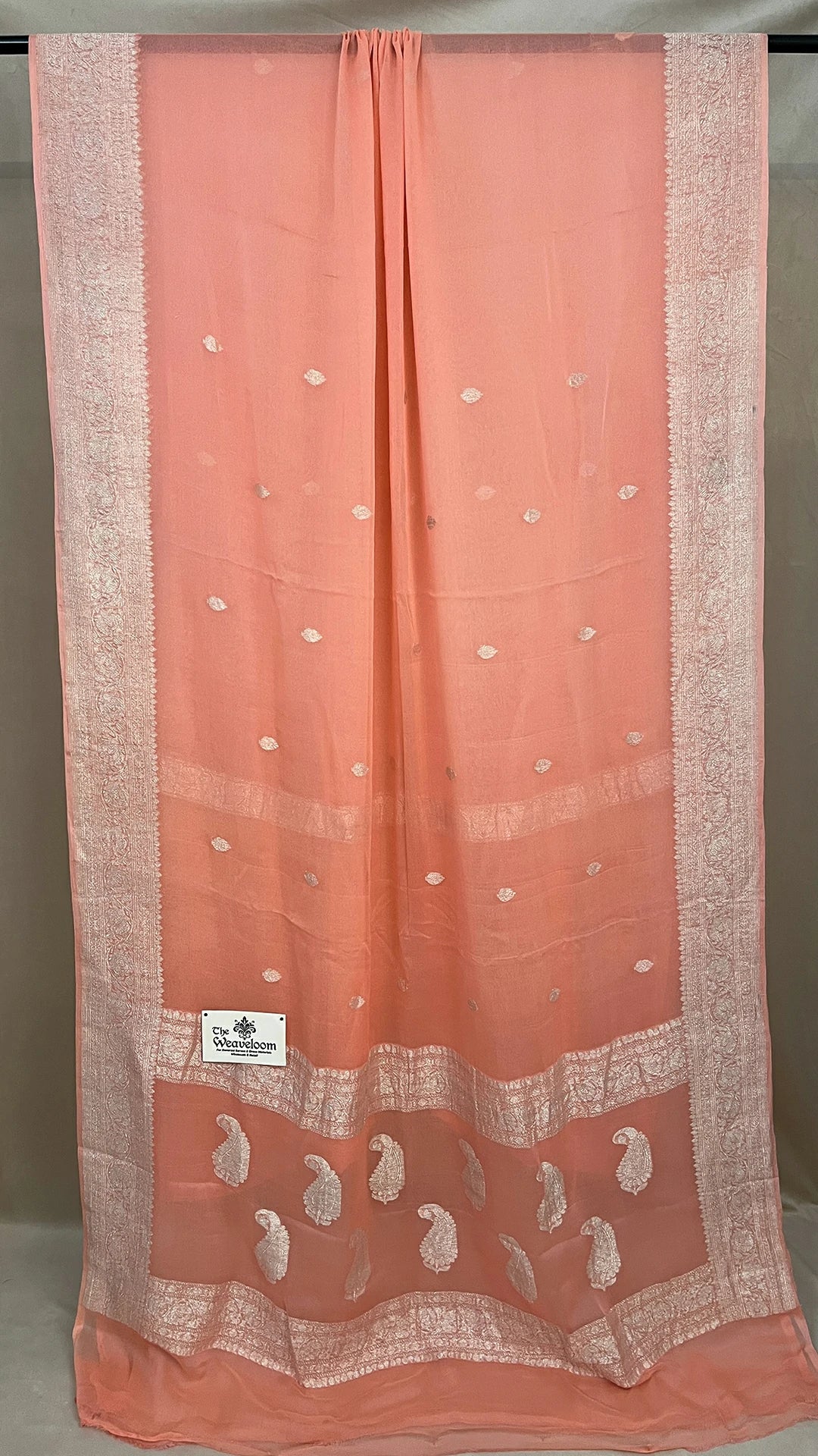 Peach Khaddi Georgette Pure Banarasi Saree with Silver Zari Border and Paisley Pallu by The Weaveloom