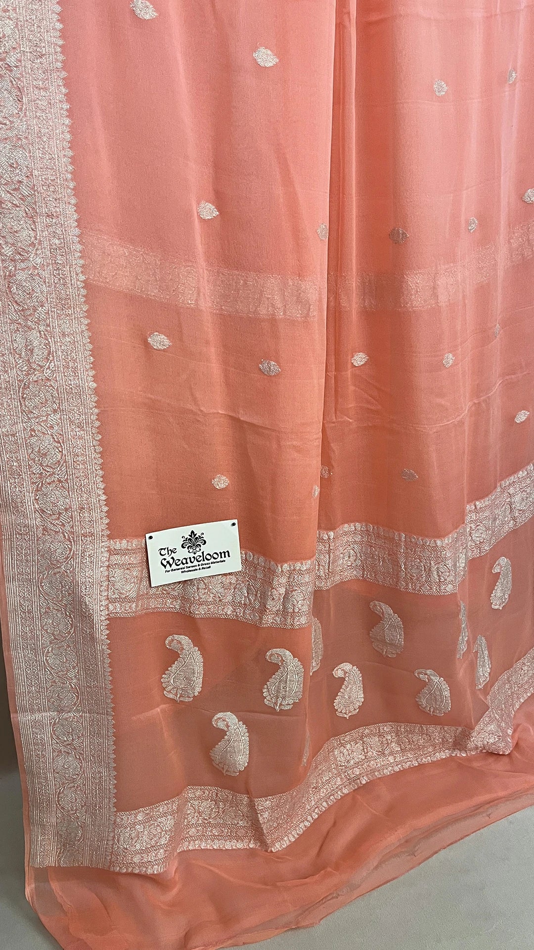 Peach Khaddi Georgette Pure Banarasi Saree with Silver Zari Border and Paisley Pallu by The Weaveloom