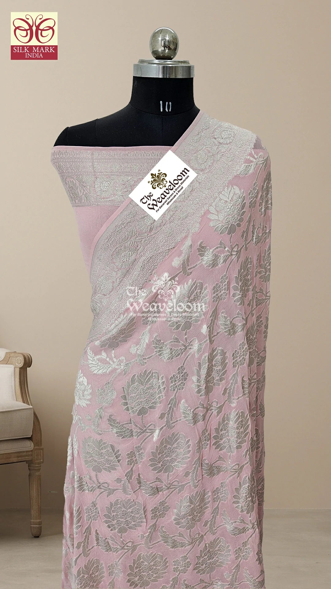 Peach Pink Silver Zari Floral Jaal Khaddi Georgette Pure Banarasi Saree draped on mannequin by The Weaveloom