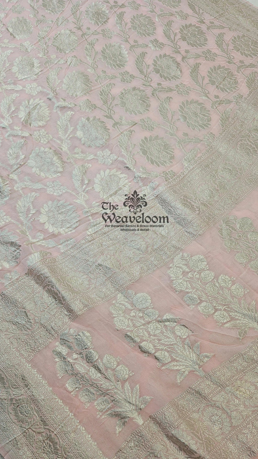 Peach Pink Silver Zari Floral Jaal Khaddi Georgette Pure Banarasi Saree draped on mannequin by The Weaveloom