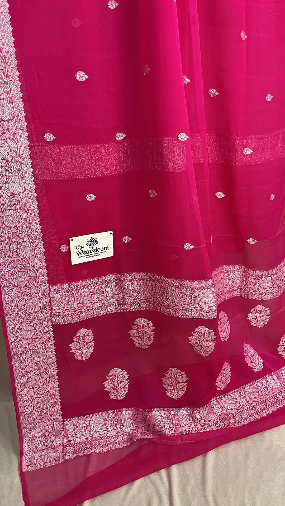 Rani Pink Khaddi Georgette Pure Banarasi Saree with Silver Zari Floral Border by The Weaveloom