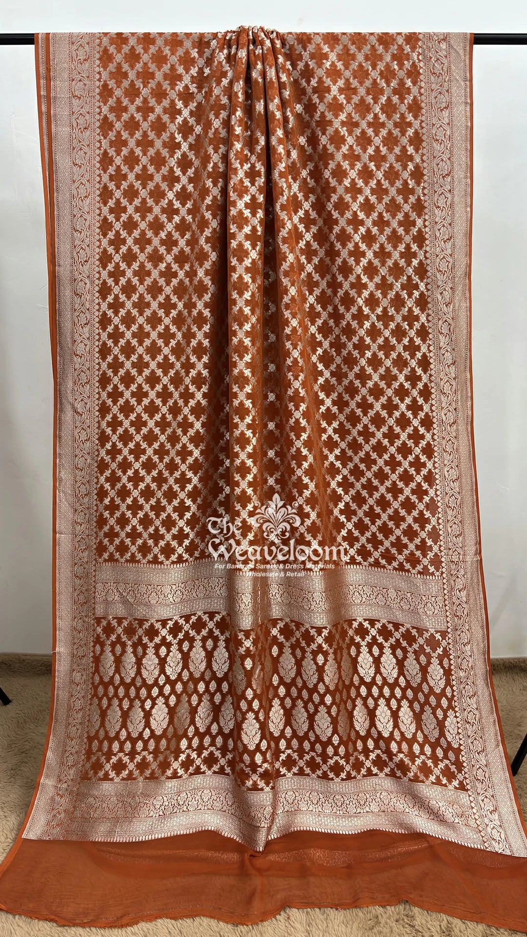 Rust silver zari jaal Khaddi Georgette pure Banarasi saree by The Weaveloom