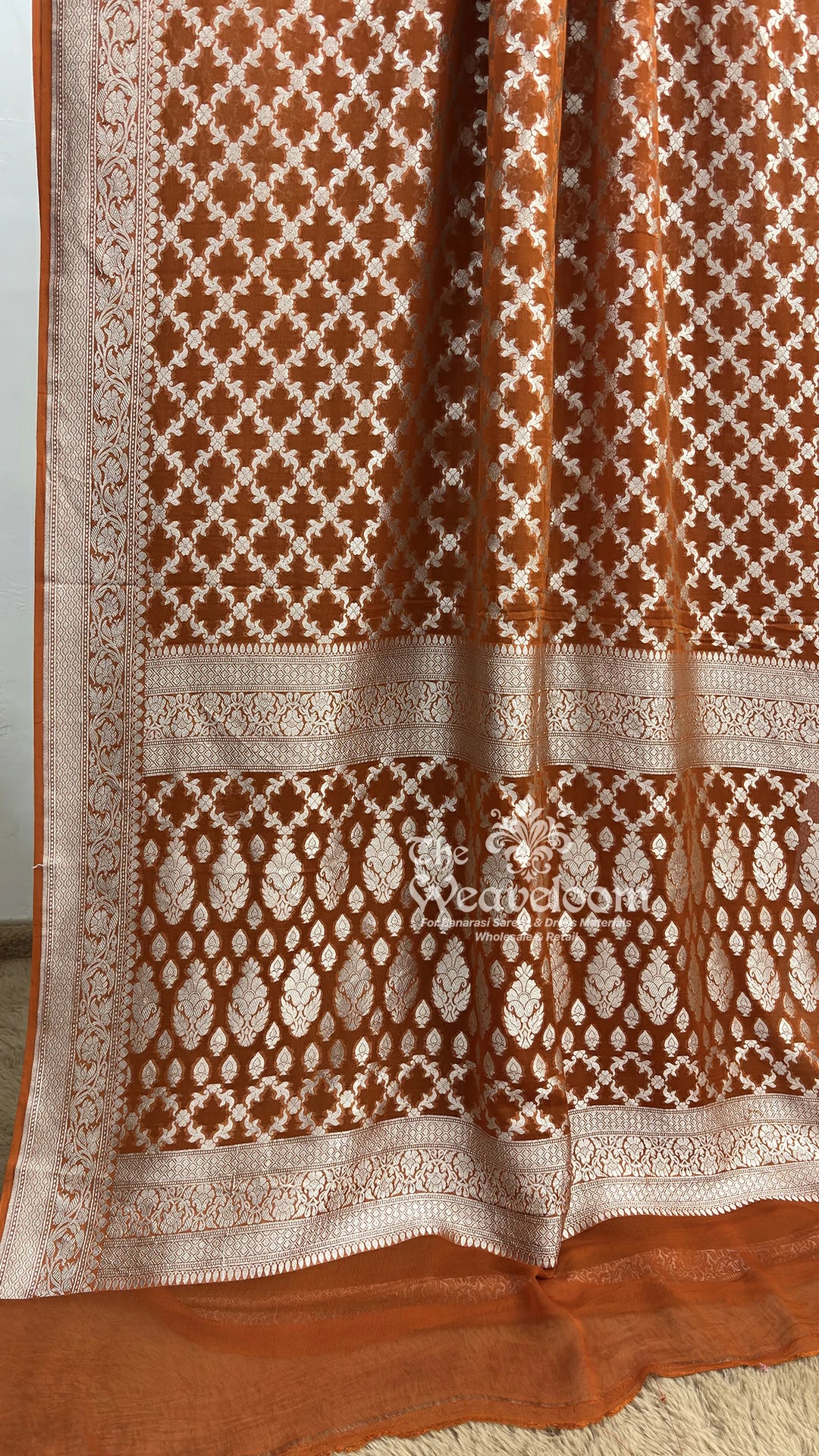 Rust silver zari jaal Khaddi Georgette pure Banarasi saree by The Weaveloom