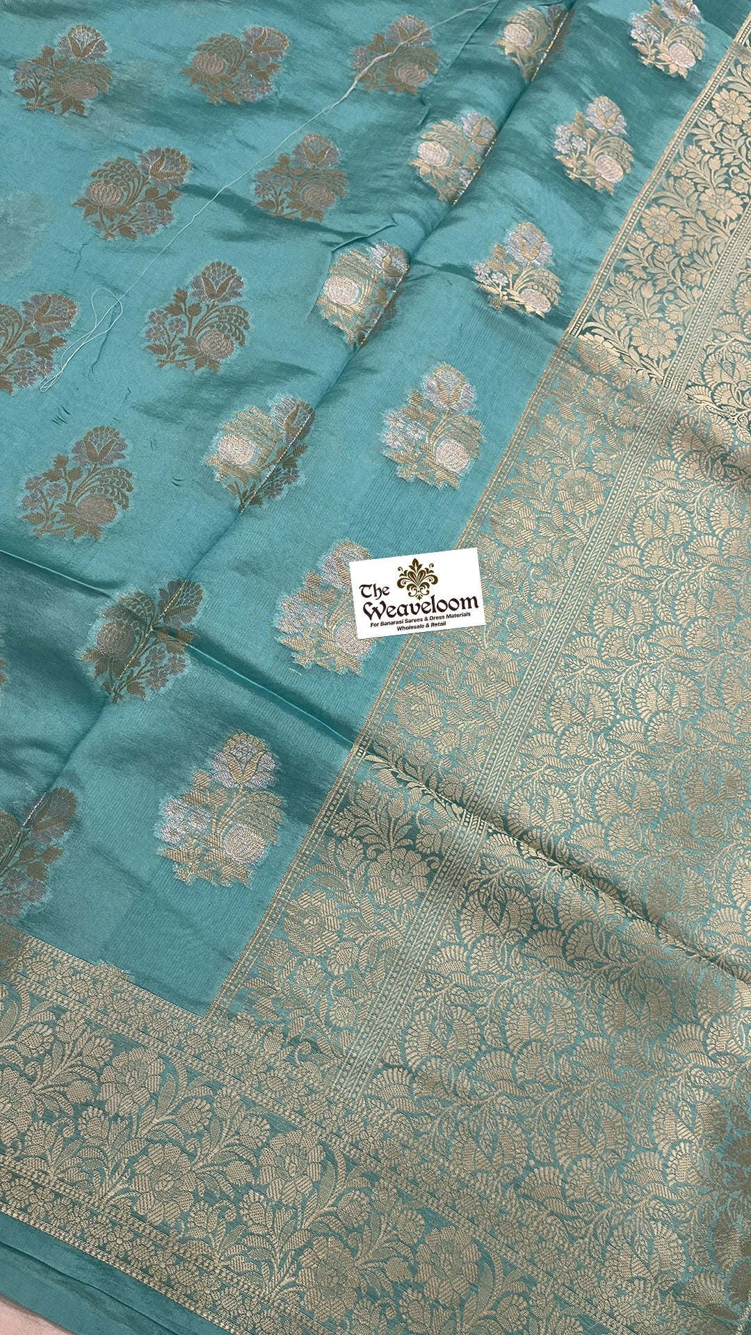Sea Green Dupion Silk Banarasi Saree with Floral Buti Gold Zari Jaal Border by The Weaveloom