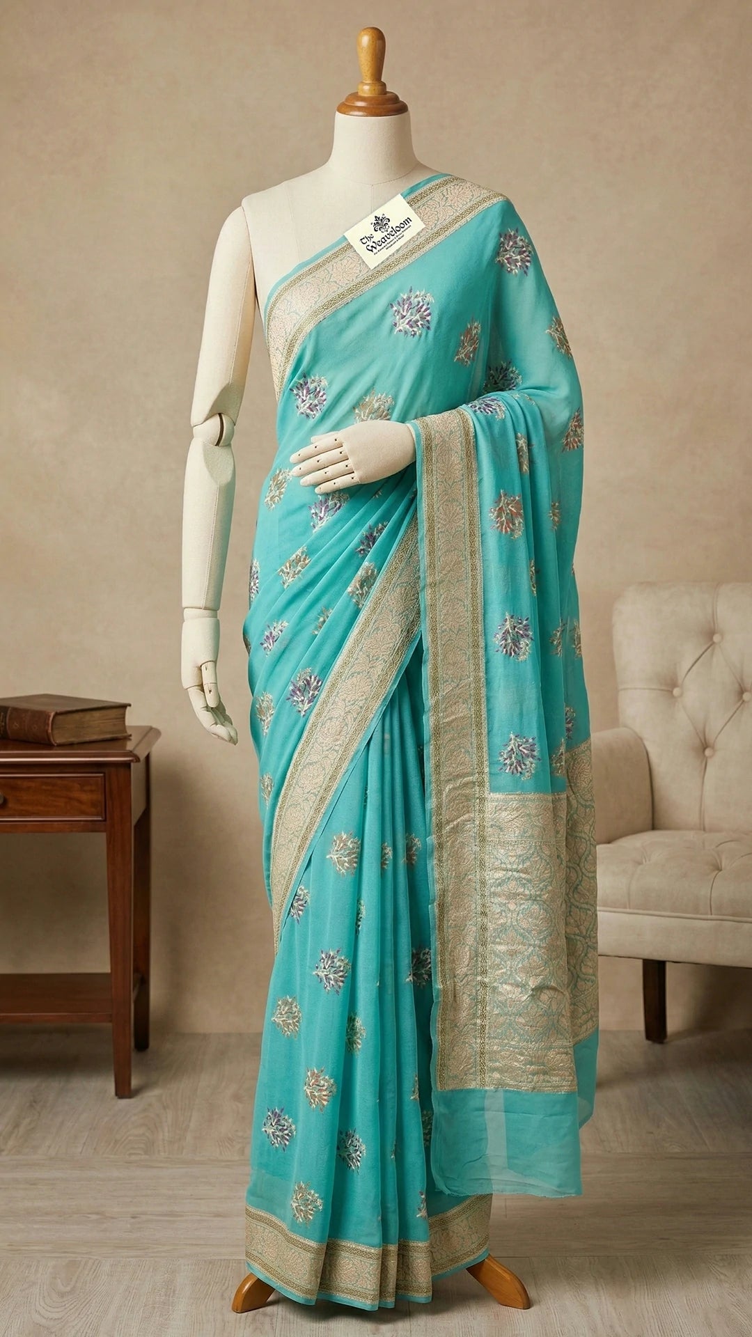 The Weaveloom sea green meenakari floral pure crepe georgette banarasi saree with golden zari border