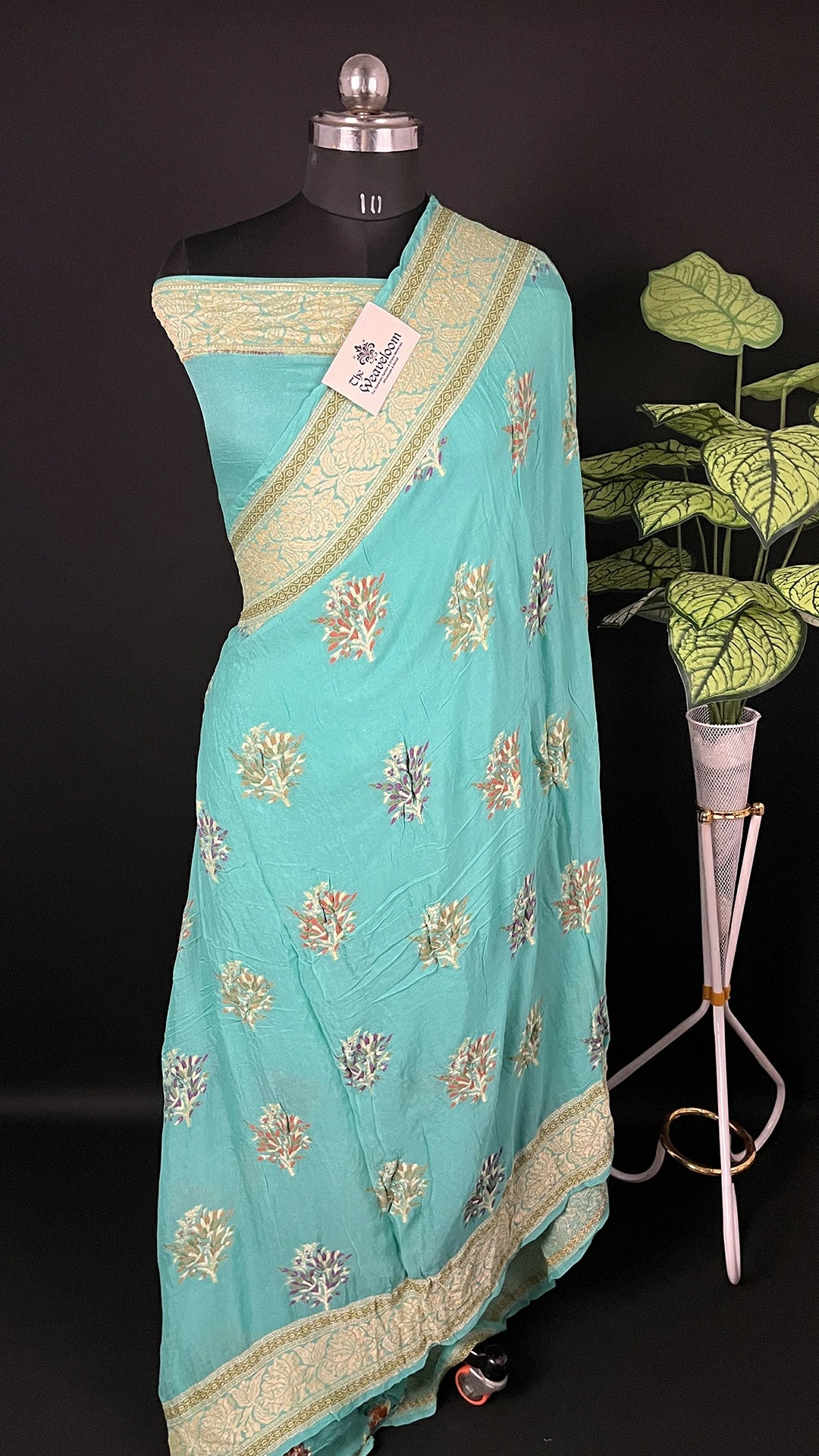 The Weaveloom sea green meenakari floral pure crepe georgette banarasi saree with golden zari border