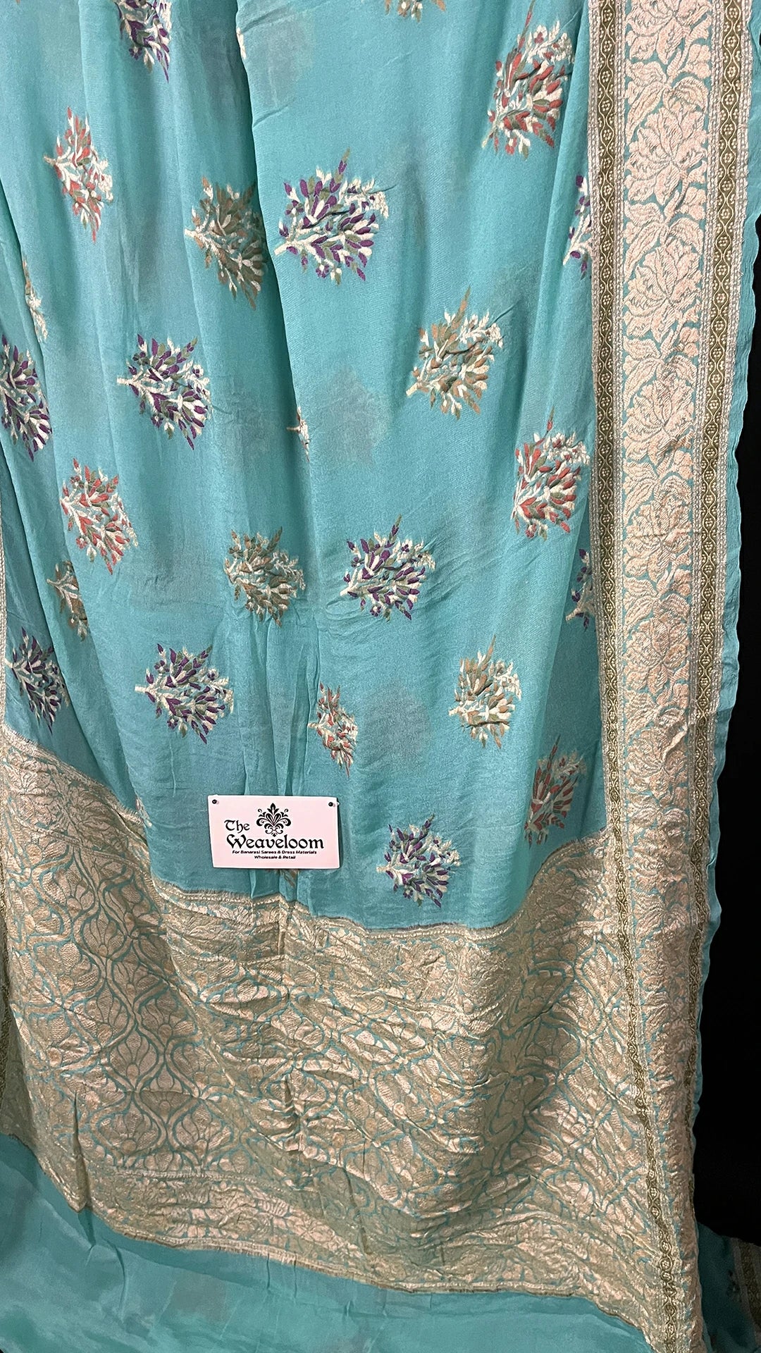 The Weaveloom sea green meenakari floral pure crepe georgette banarasi saree with golden zari border
