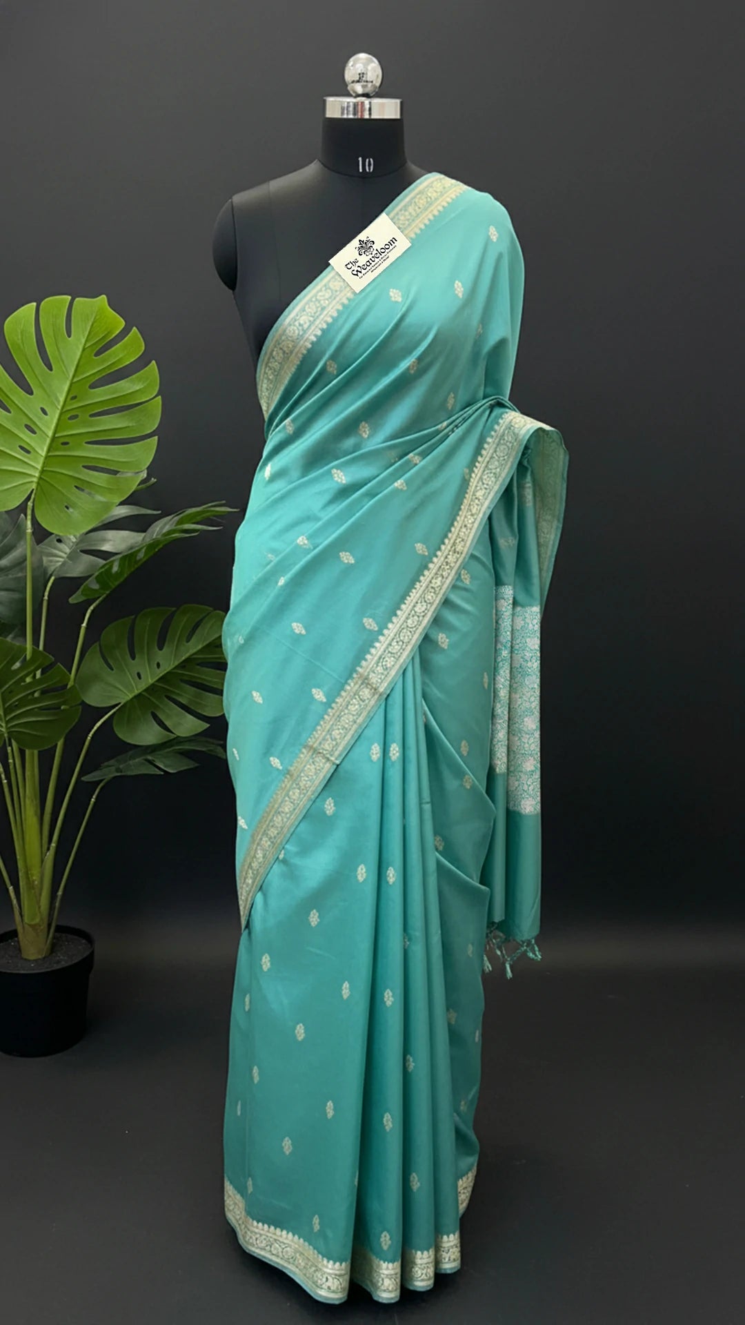 Sea Green Pure Katan Silk Handloom Banarasi Saree with Silver Zari Border and Floral Pallu by The Weaveloom